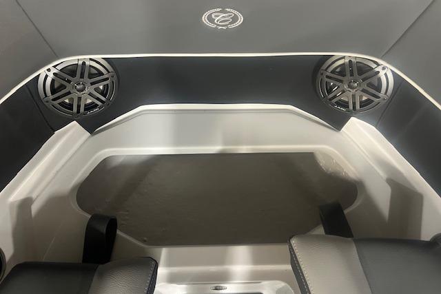 2025 Cobalt CS23 Surf boat interior with dual speakers and sleek design.