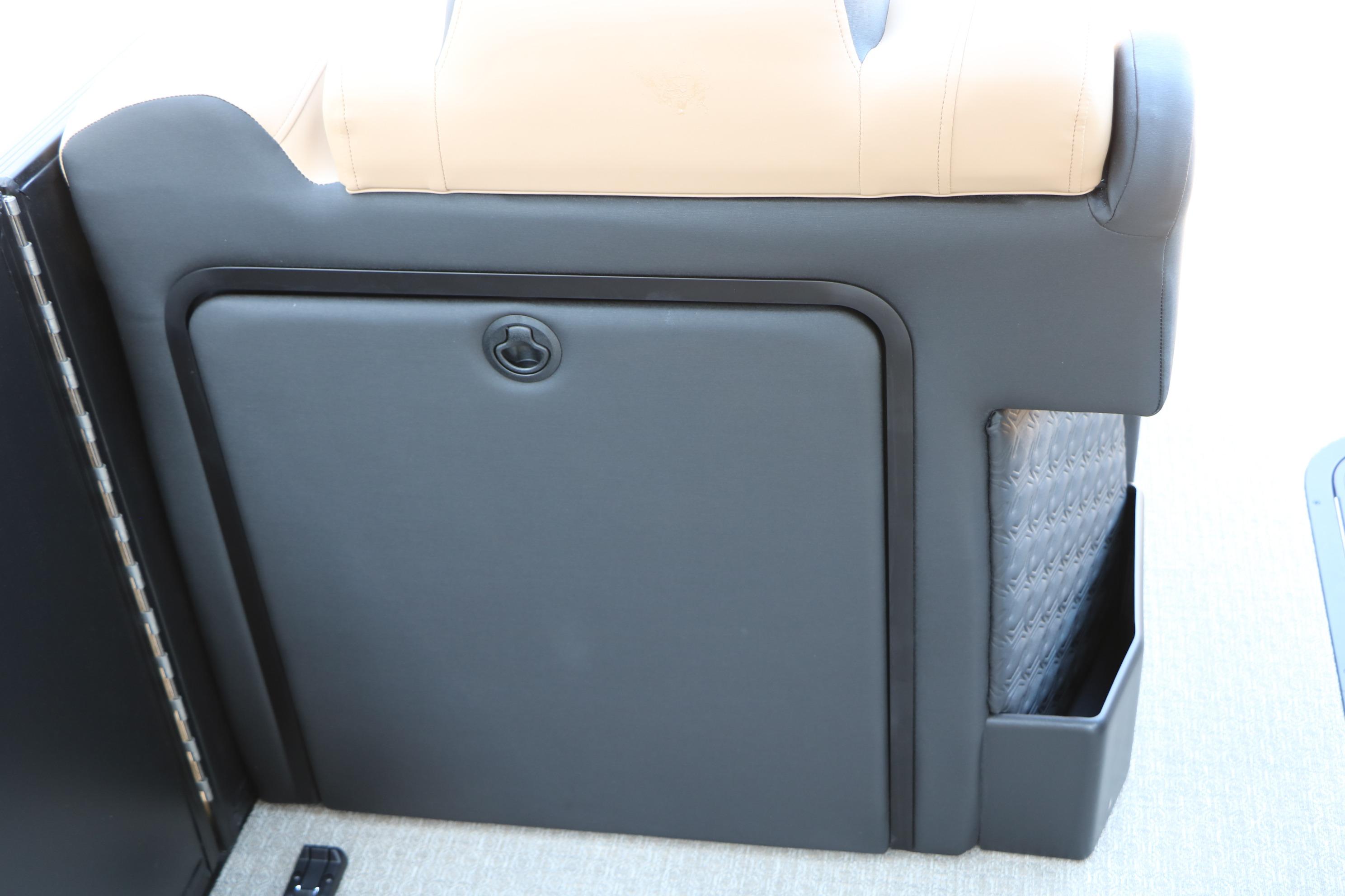 Evotti 725 CS Tri-Toon 2026 interior storage compartment with sleek design and beige upholstery.