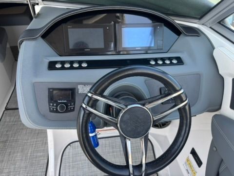 Dashboard of a 2020 Cobalt SC23 boat with modern displays.