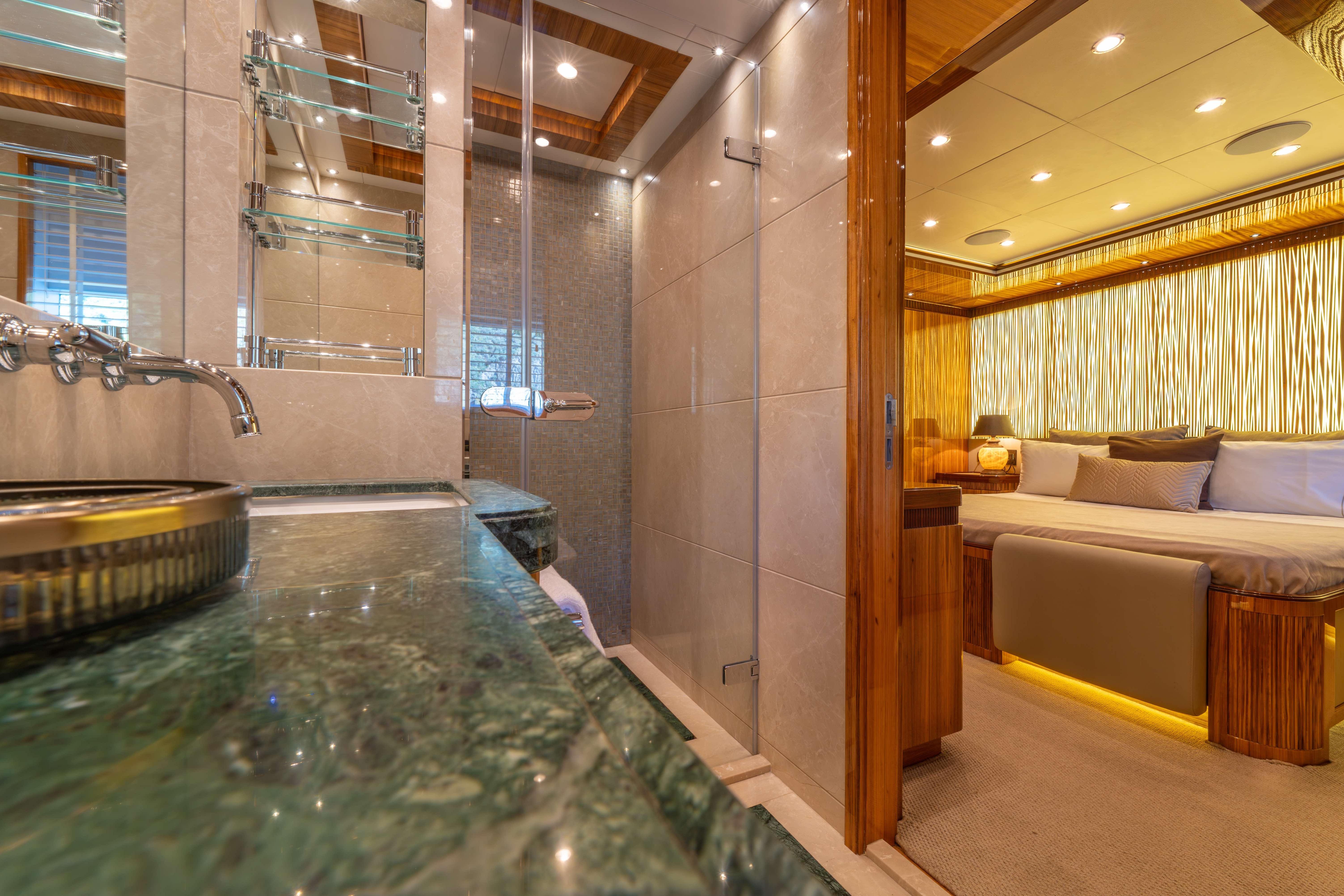 Luxurious Bilgin 147 yacht interior, featuring elegant bathroom and cozy bedroom, 2014 model.