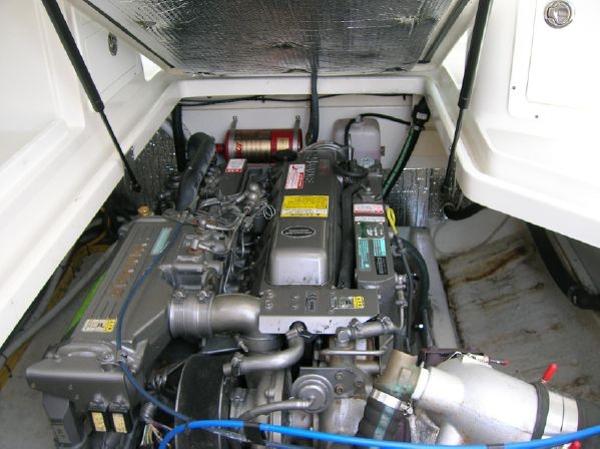 Engine compartment of a 2007 Back Cove 29 boat, showcasing detailed mechanical components.