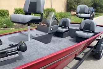 2026 Tracker Bass Tracker Classic XL boat with seating and steering console.