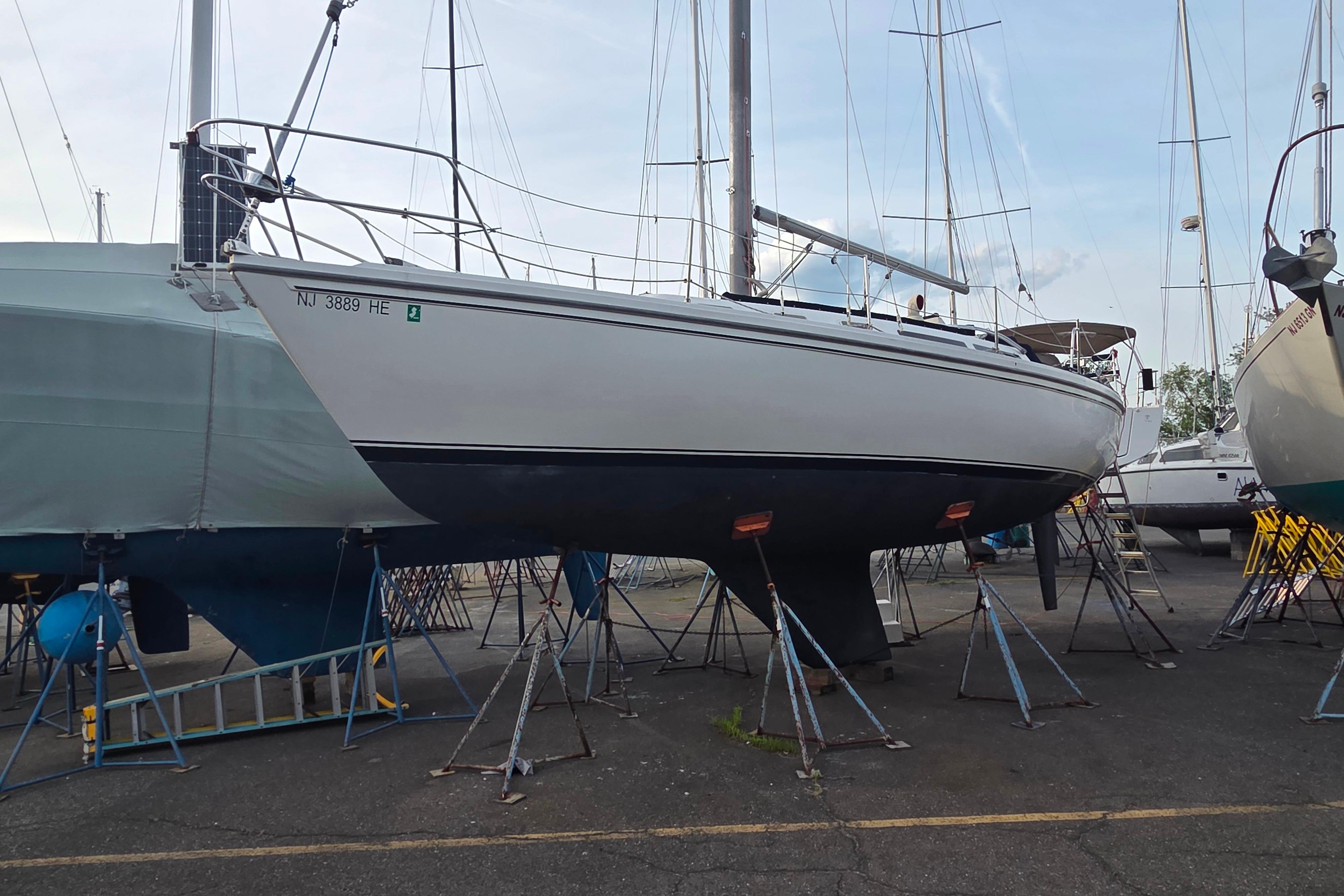 1986 Catalina 355 sailboat on stands in a boatyard, ready for maintenance.