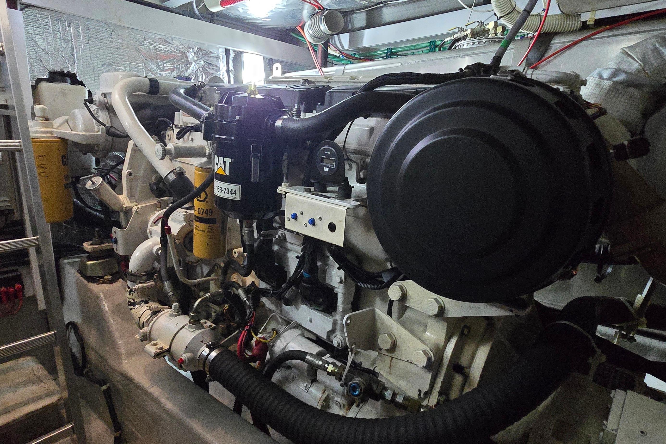 Engine room of 2004 Sunseeker Camargue 50 yacht, featuring CAT machinery.