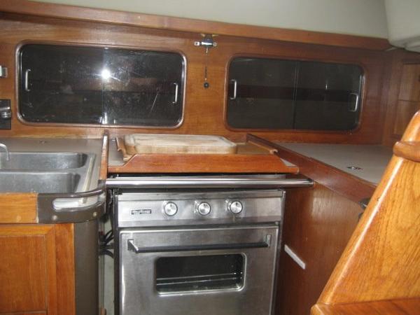 Interior of a C&C Landfall yacht with a stove and sink.