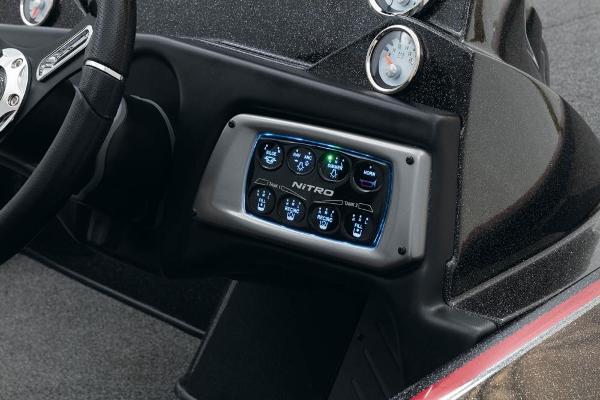 Nitro Z20 2022 boat dashboard with illuminated control panel and gauges.