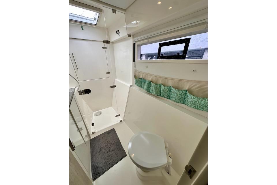 Bathroom interior of 2017 Leopard 40 yacht with shower and toilet.