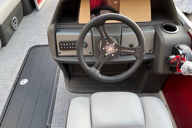 2026 Sun Tracker Party Barge 22 RF XP3 steering console with modern controls and seating.