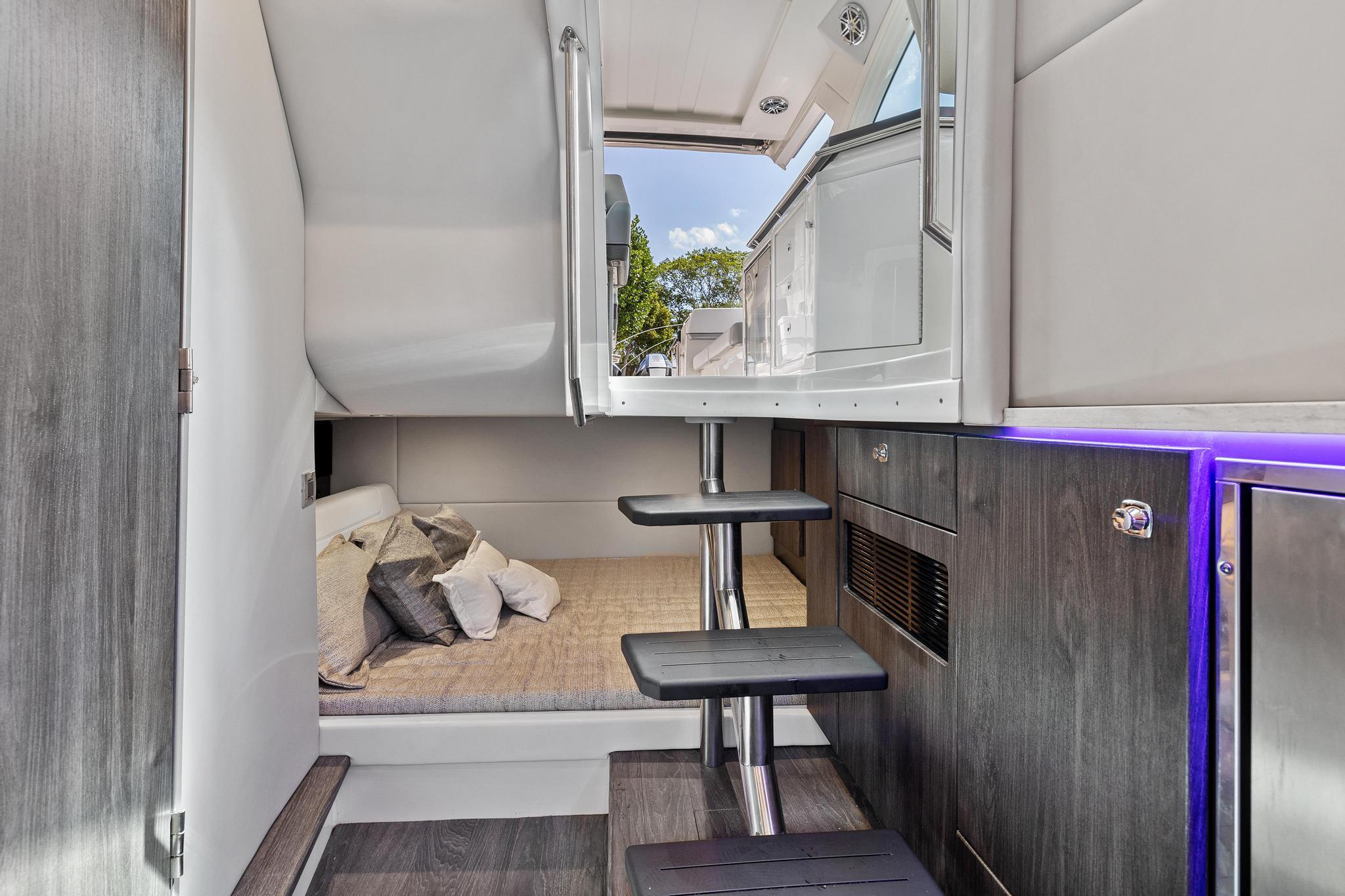 Interior of 2021 Formula 380 Super Sport Crossover OB with stairs and bed.