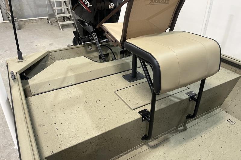 2025 SeaArk Shadow 18T boat interior with seating and Mercury engine.