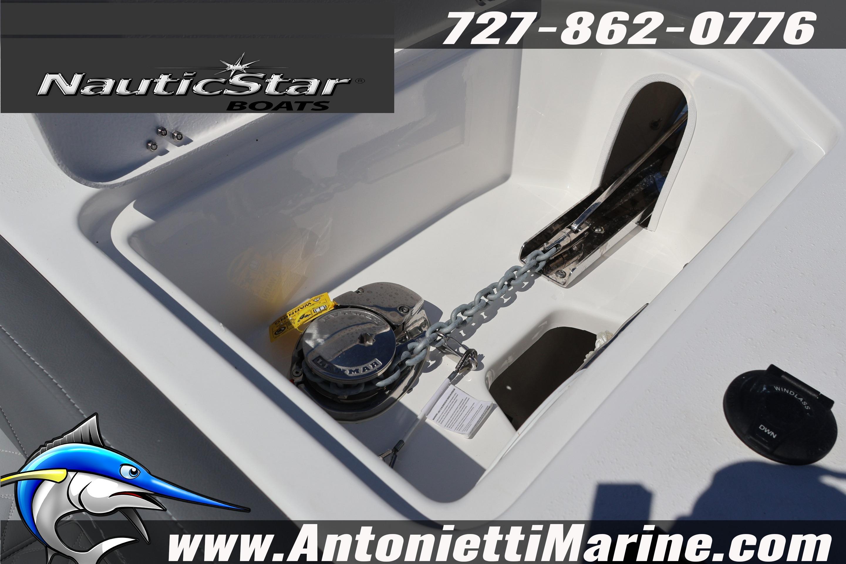 NauticStar 292 Legacy boat anchor compartment with chain and windlass, 2026 model.