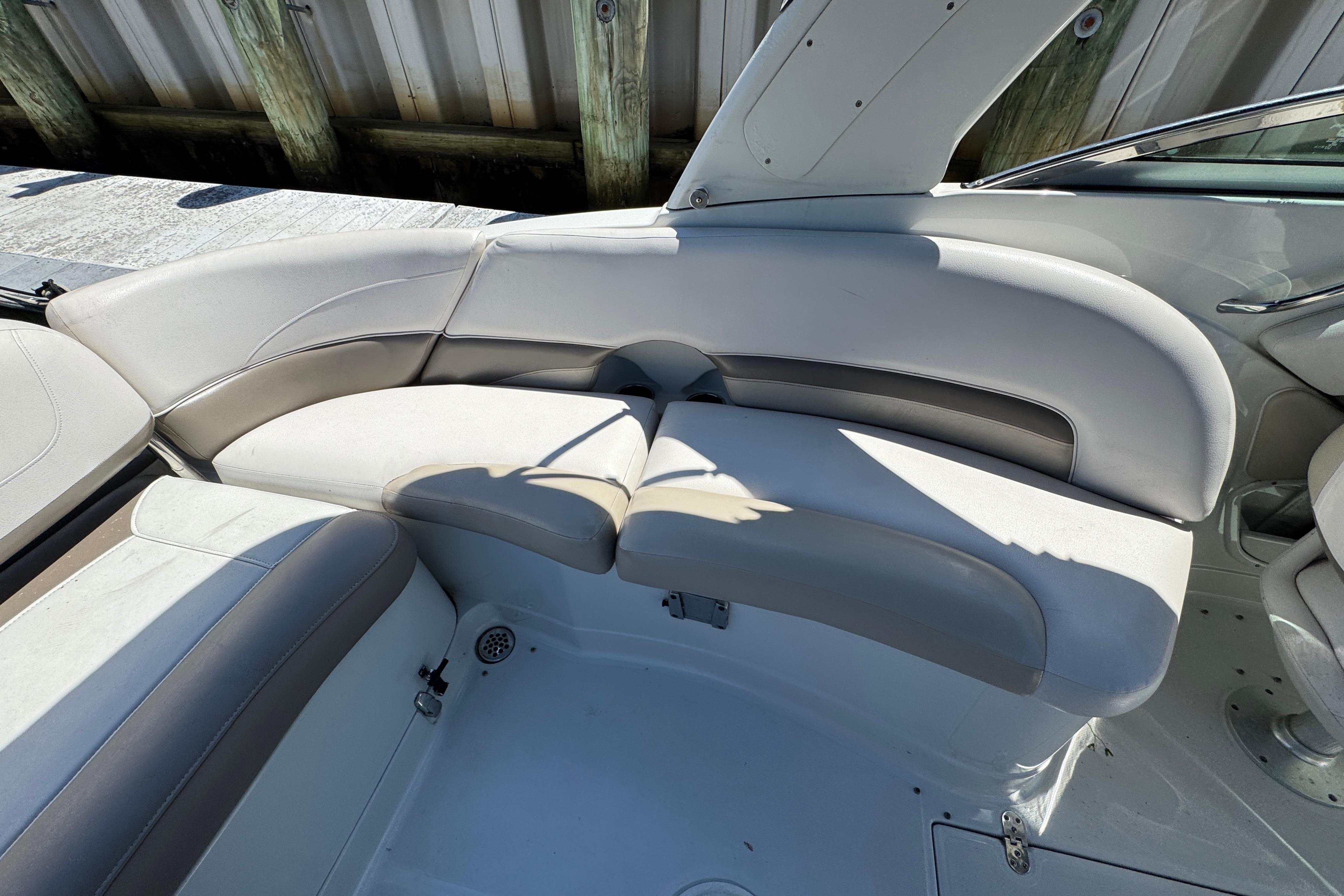 2013 Crownline Eclipse E6 XS boat interior with cushioned seating.