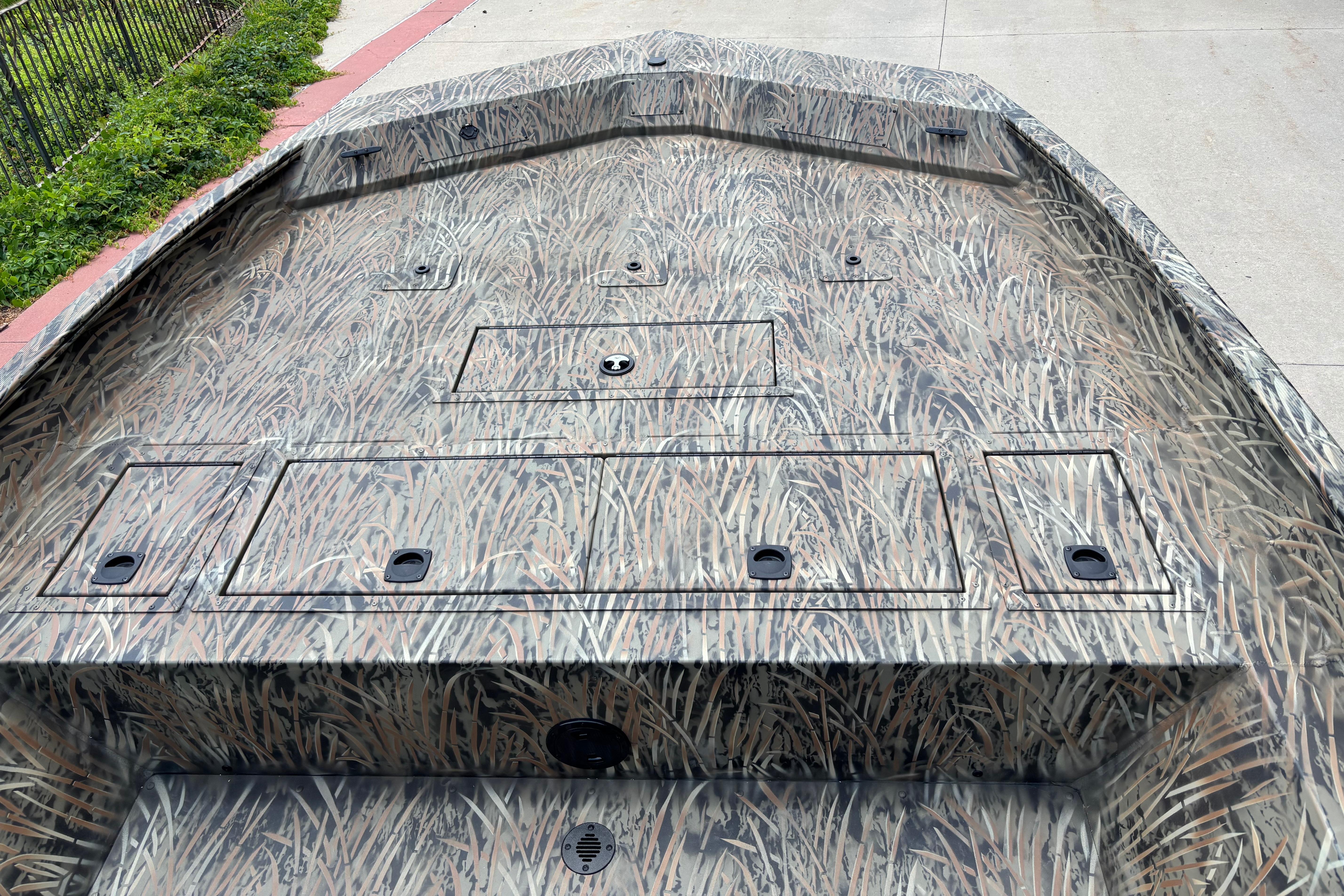 2026 Tracker Grizzly 2072 CC boat with camouflage pattern on deck.