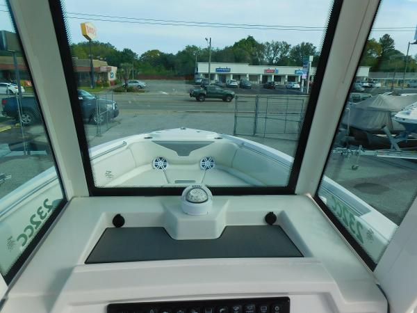 Interior view of 2025 Sailfish 232 CC boat, showcasing dashboard and bow area.