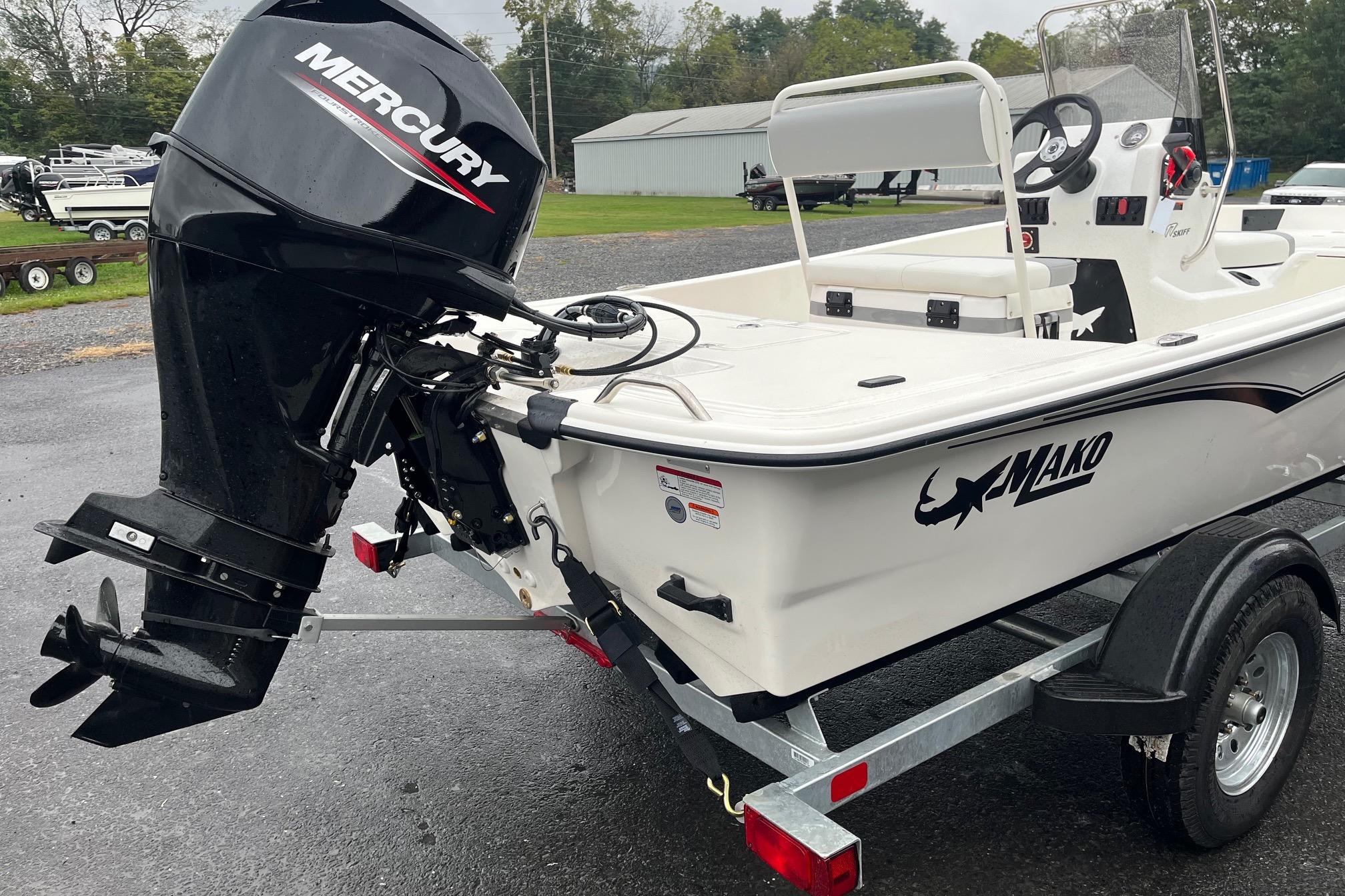 2026 Mako Pro Skiff 17 CC boat with Mercury outboard motor on trailer.