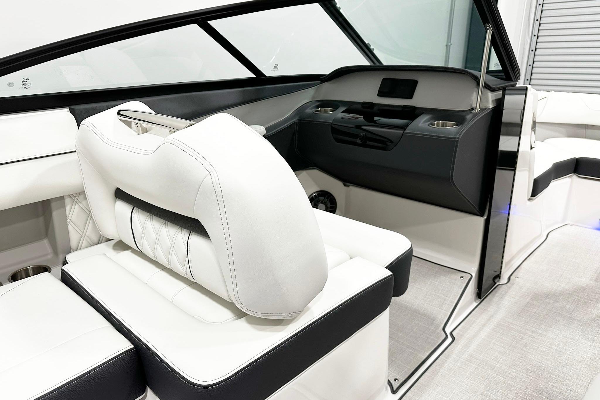 2025 Regal LS2 boat interior with white leather seating and modern dashboard design.