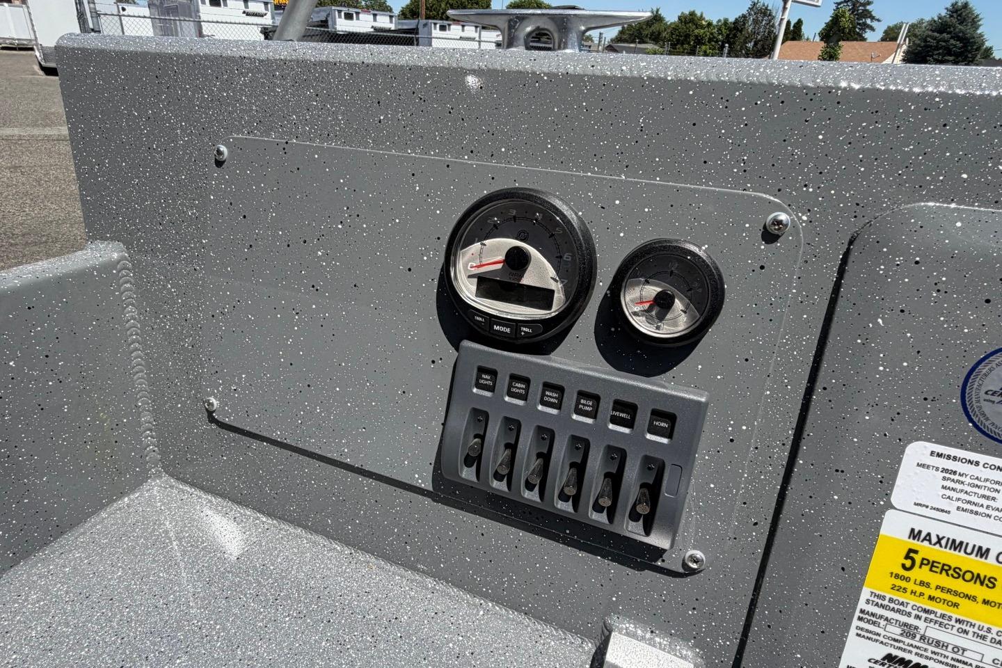 Dashboard of 2026 Thunder Jet 209 Rush OT boat with gauges and switches.