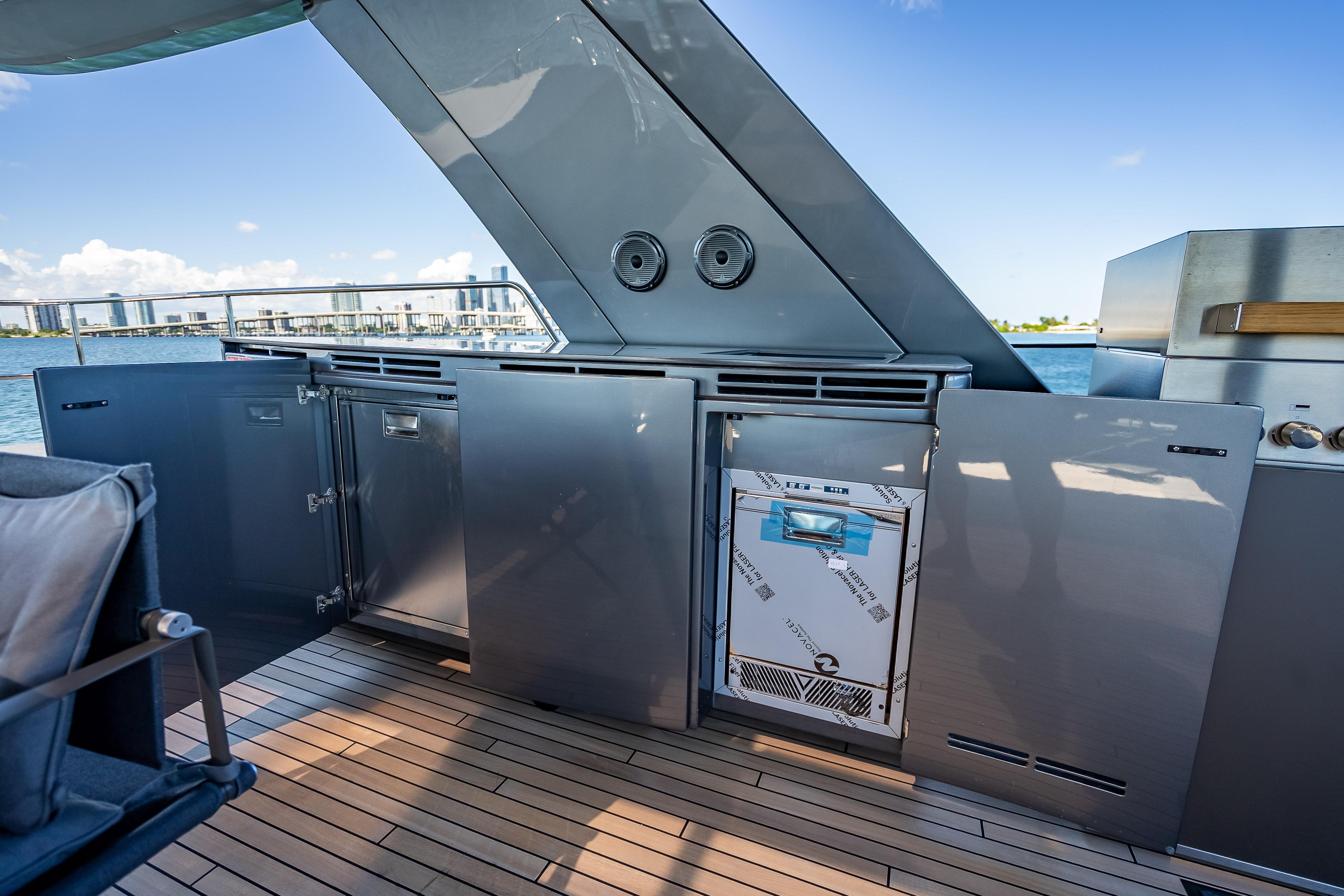 Outdoor kitchen on 2026 Sunreef 60 Power yacht with sleek cabinetry and ocean view.