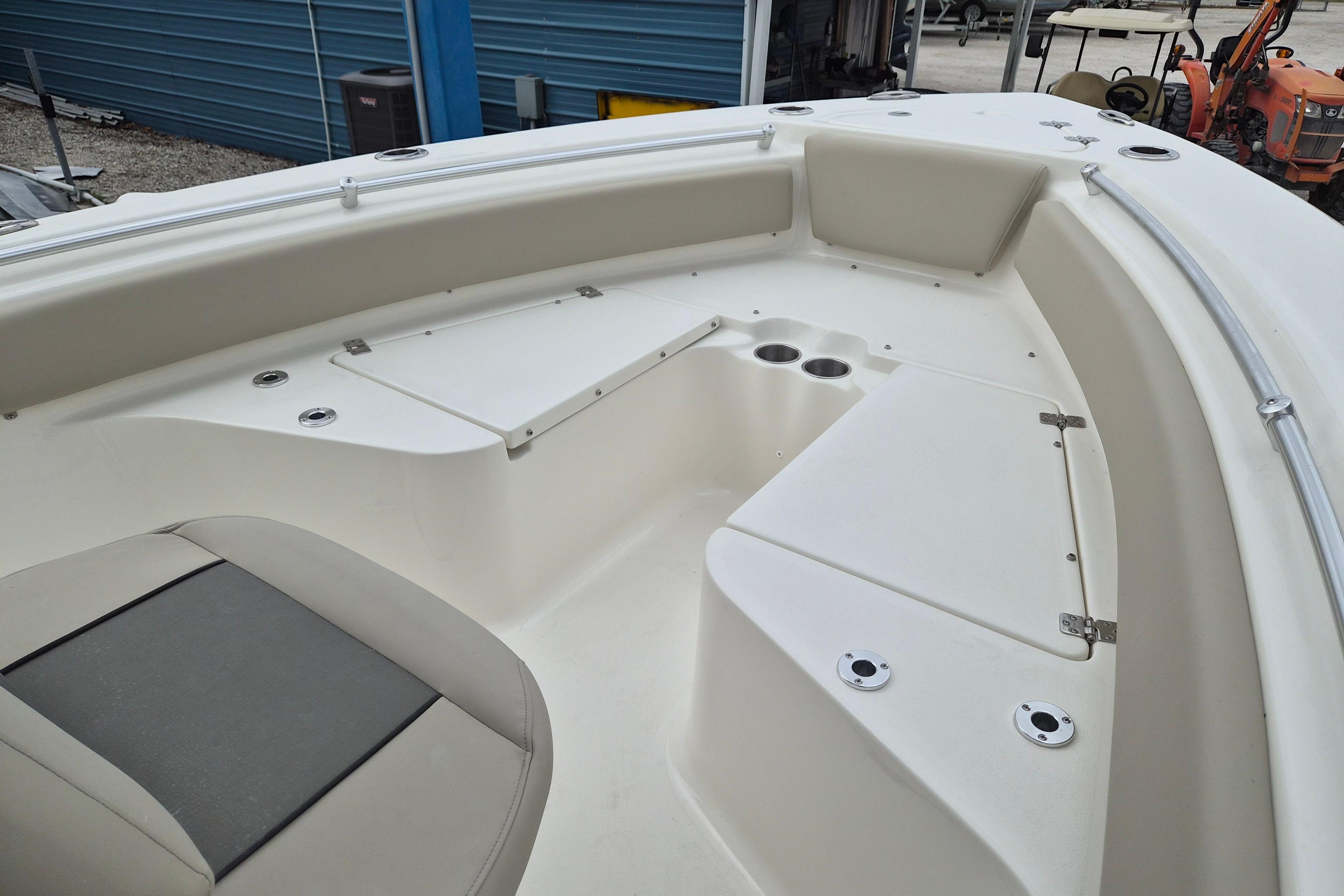 2026 Key West 219 FS boat interior with seating and storage compartments.