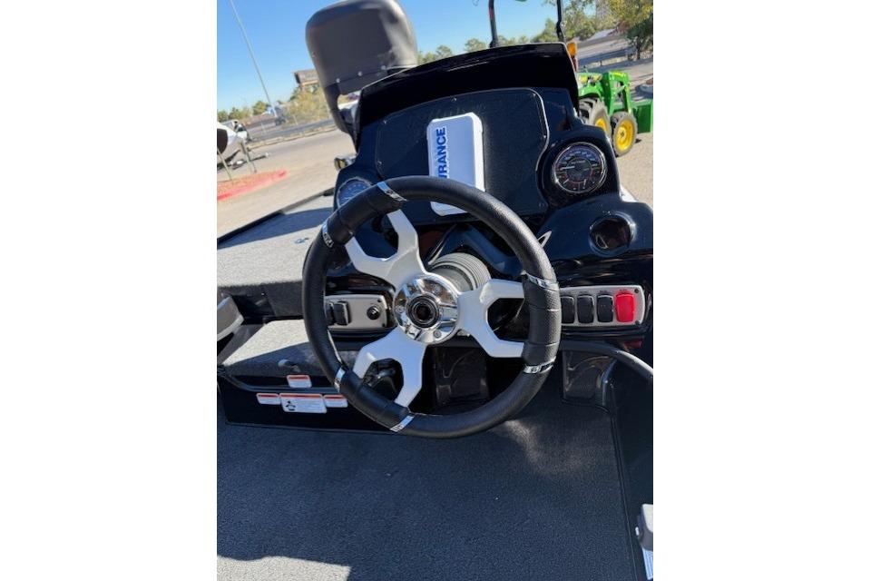 Steering wheel of a 2026 Nitro Z17 boat with control panel and gauges.