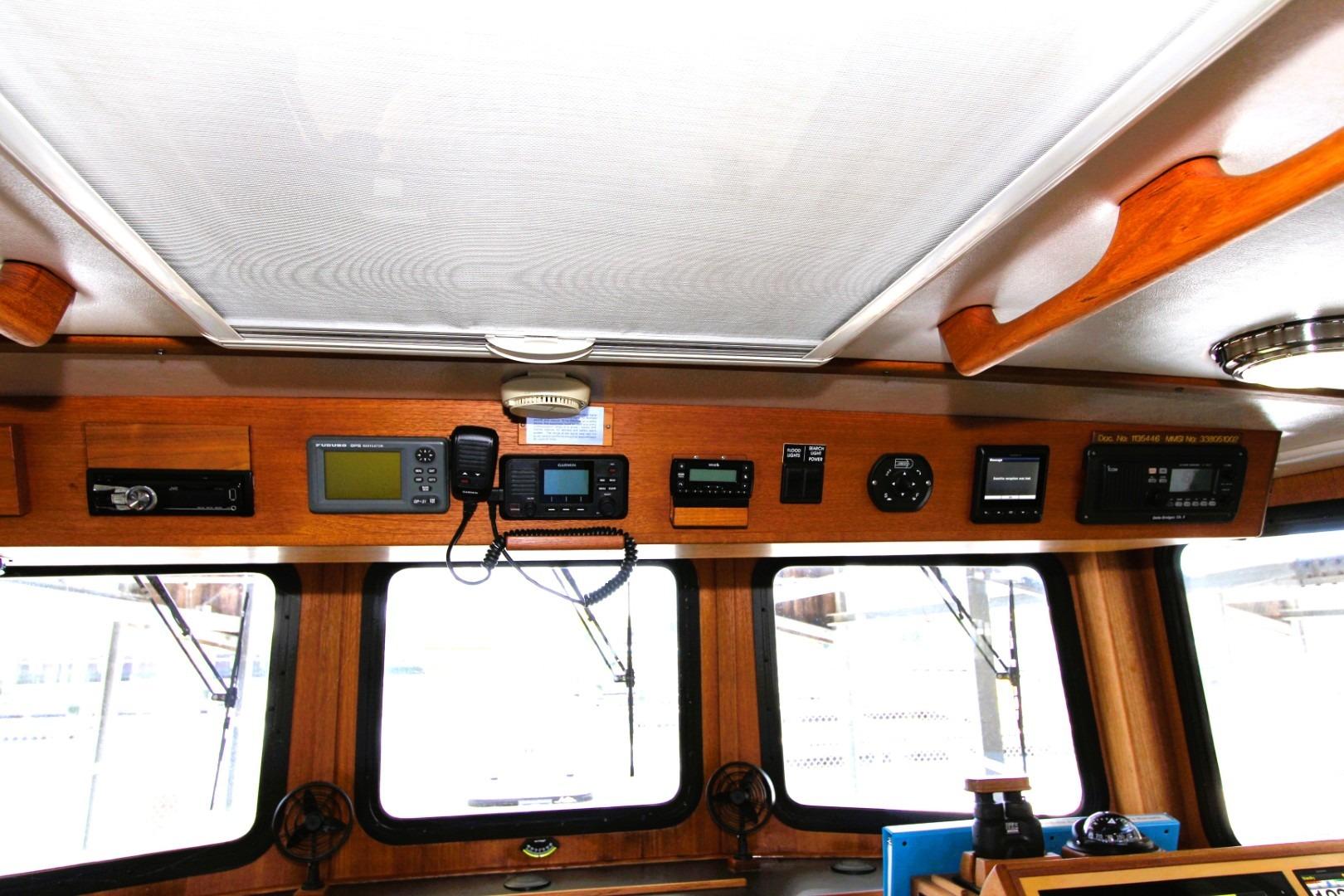 Interior view of a 2002 Nordic Tug 37 dashboard with navigation instruments.