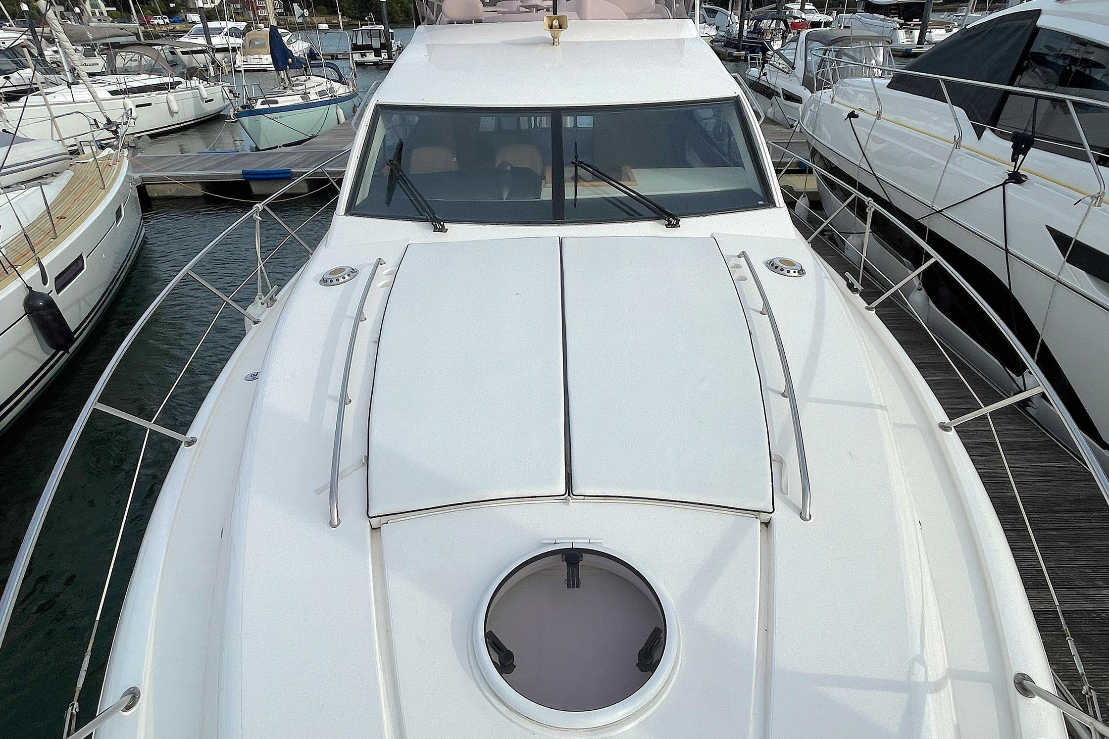 2006 Fairline Phantom 46 yacht docked at marina, showcasing sleek deck design.