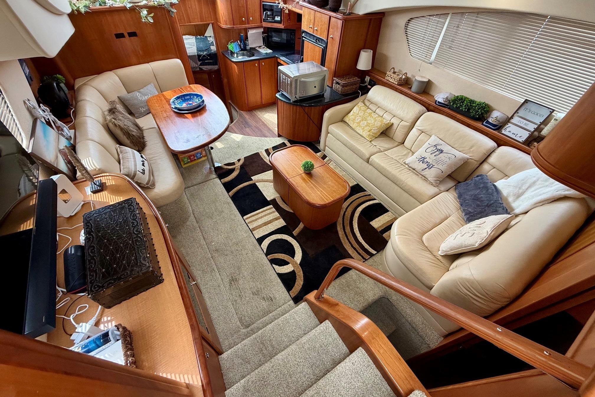 Luxurious interior of a 2004 Silverton 39 Motor Yacht with elegant furnishings and decor.