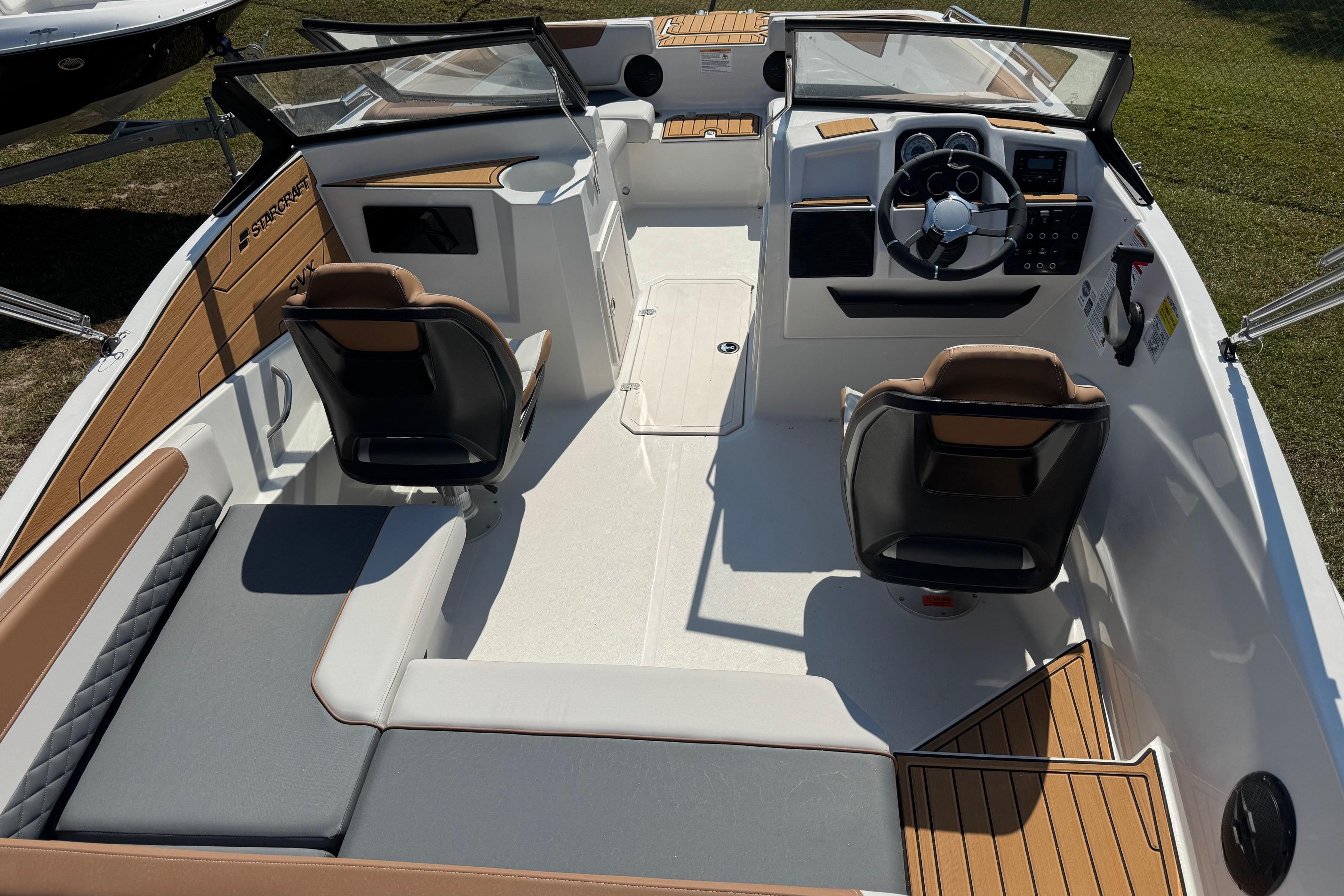 2026 Starcraft SVX 190 OB boat interior with modern seating and steering console.
