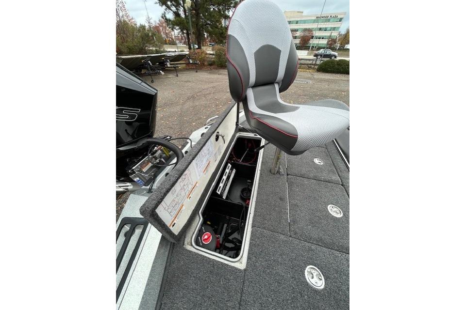 2024 Ranger Z519 Ranger Cup Equipped boat with open storage compartment and seat.