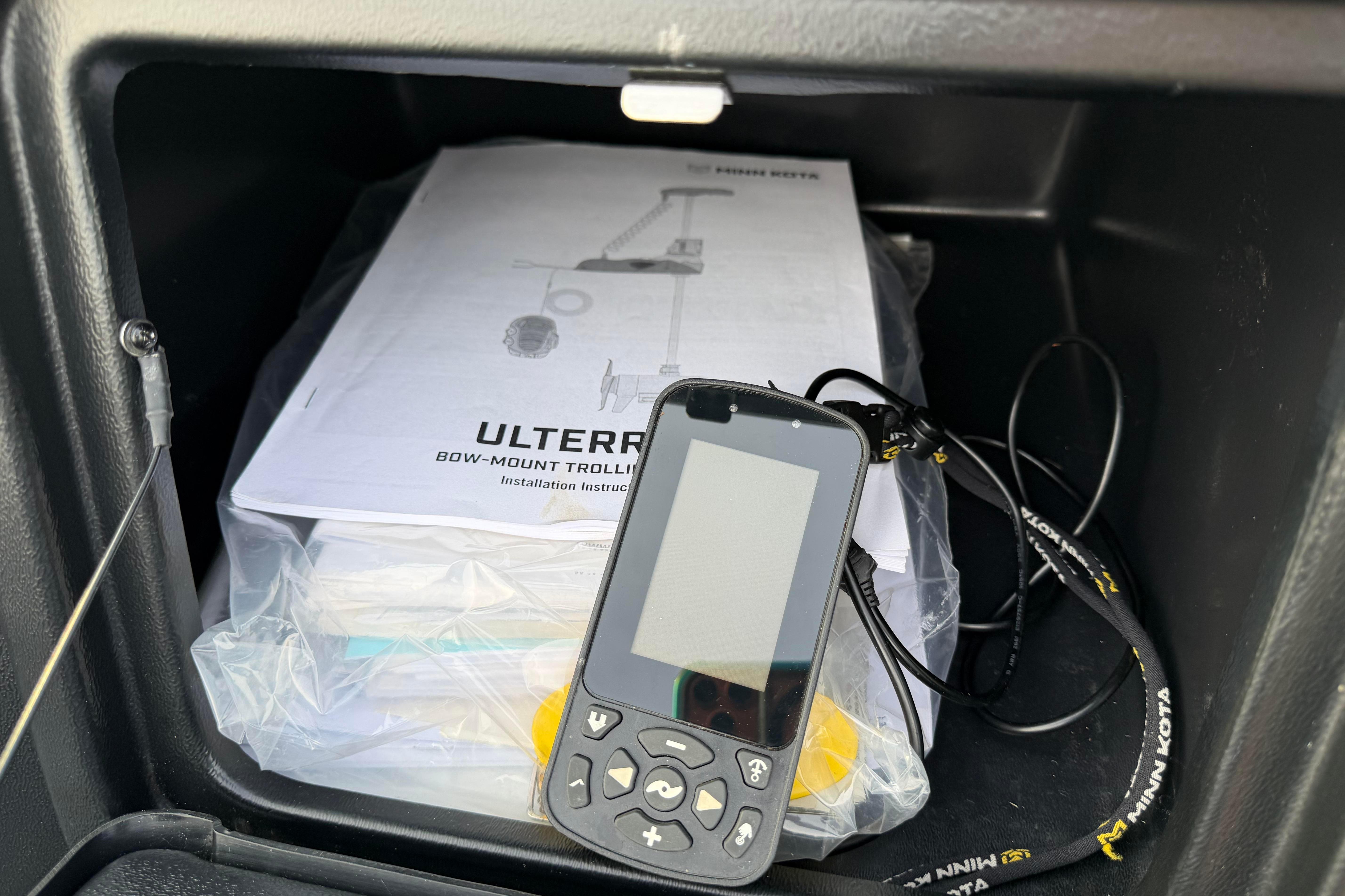 Remote control and manual for Minn Kota trolling motor in 2019 Alumacraft Trophy 205 boat.