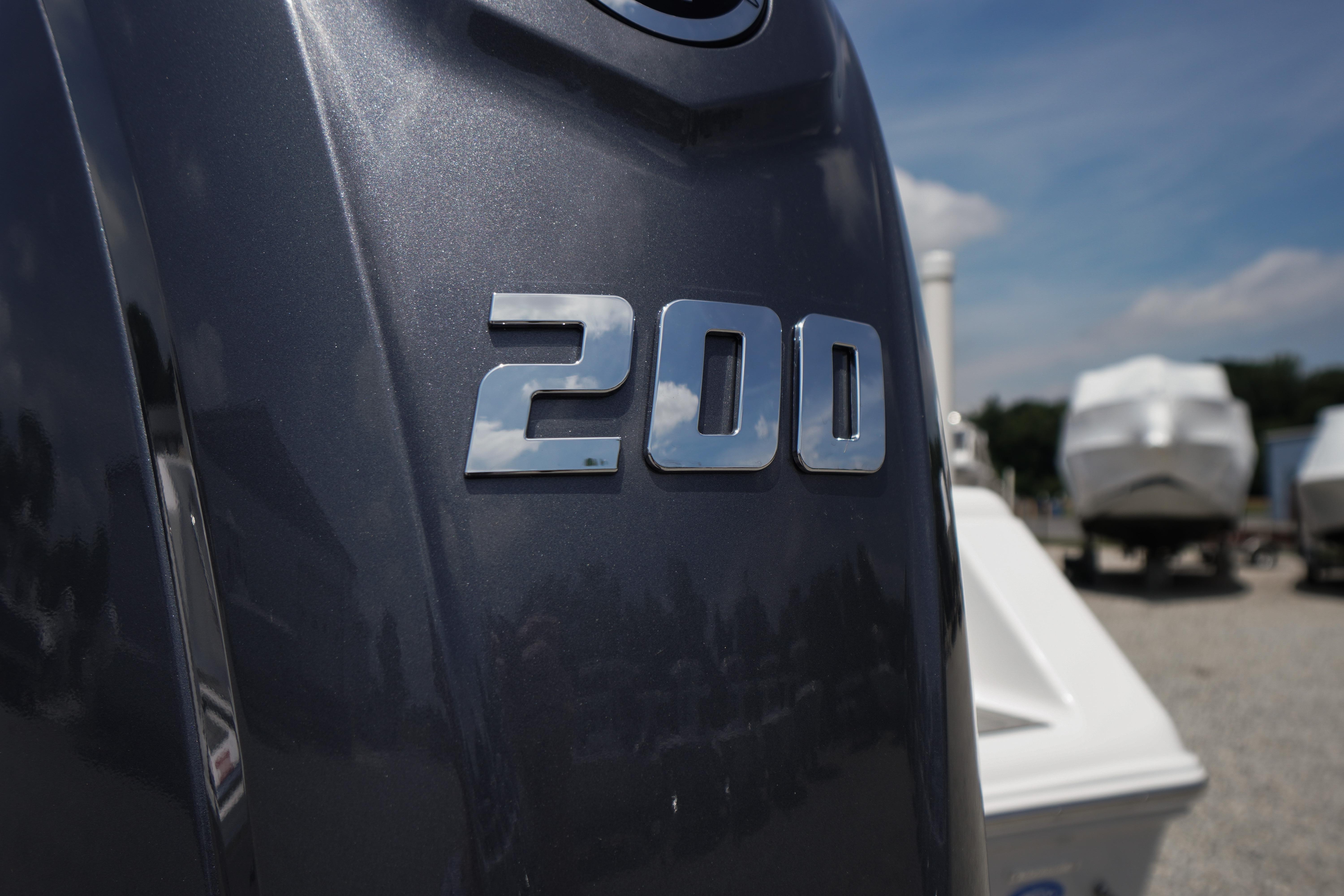 Close-up of 2027 Tidewater 220 CC Adventure boat engine with '200' emblem.