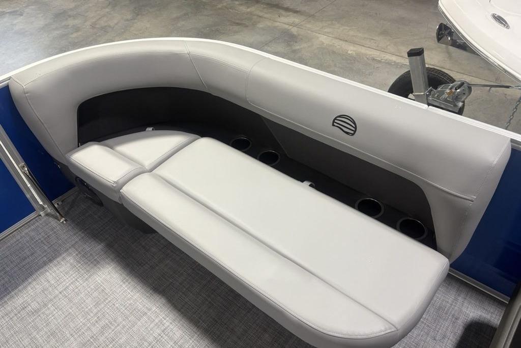 2026 Sun Tracker Party Barge 16 DLX interior seating with cup holders.