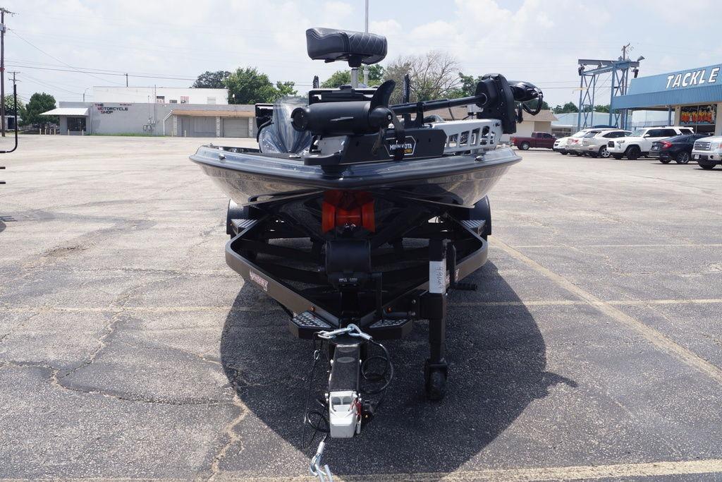2027 Phoenix 921 Elite X II boat on trailer in parking lot.