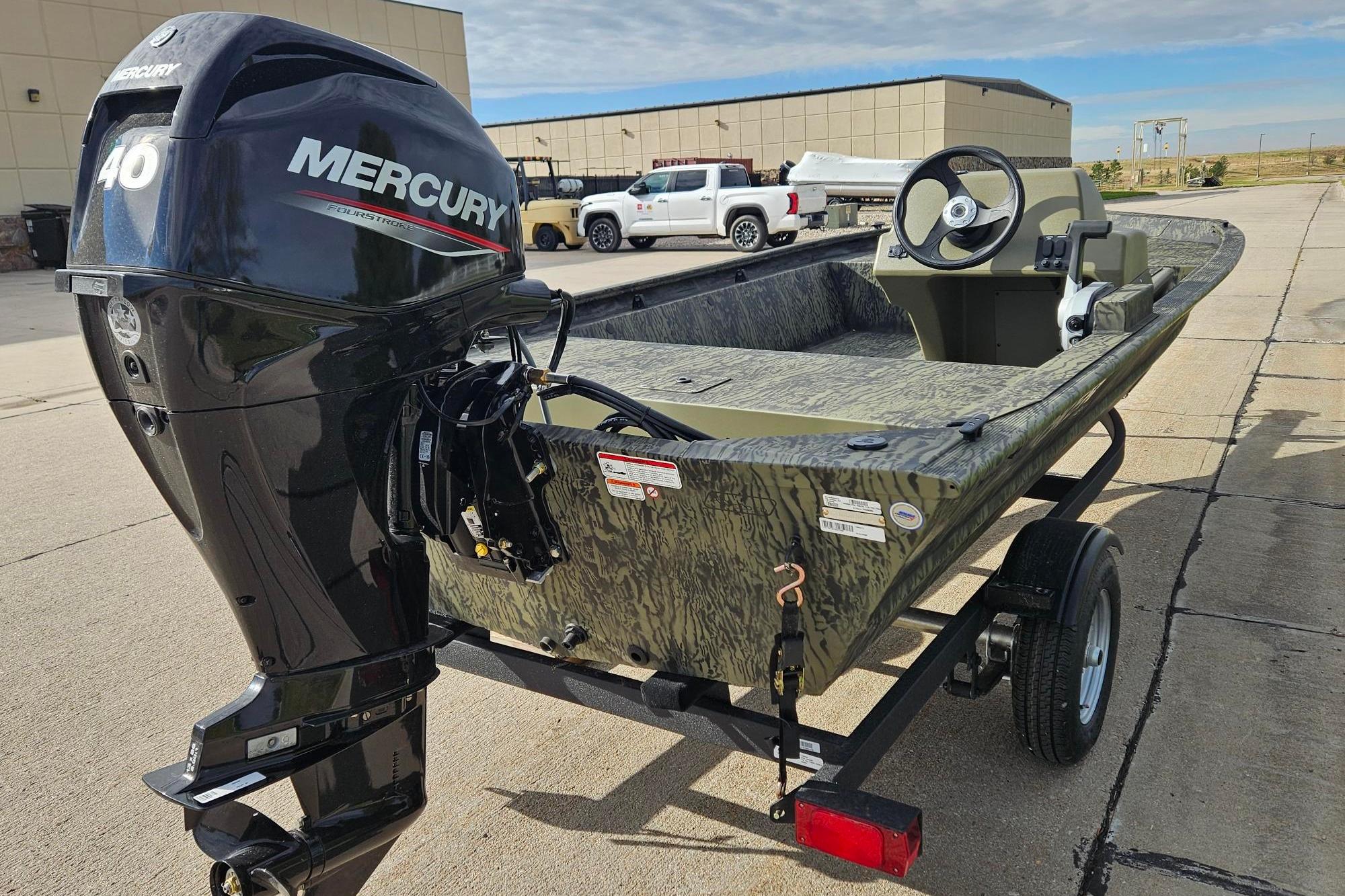 2026 Tracker Grizzly 1648 SC boat with Mercury 40 engine on trailer.