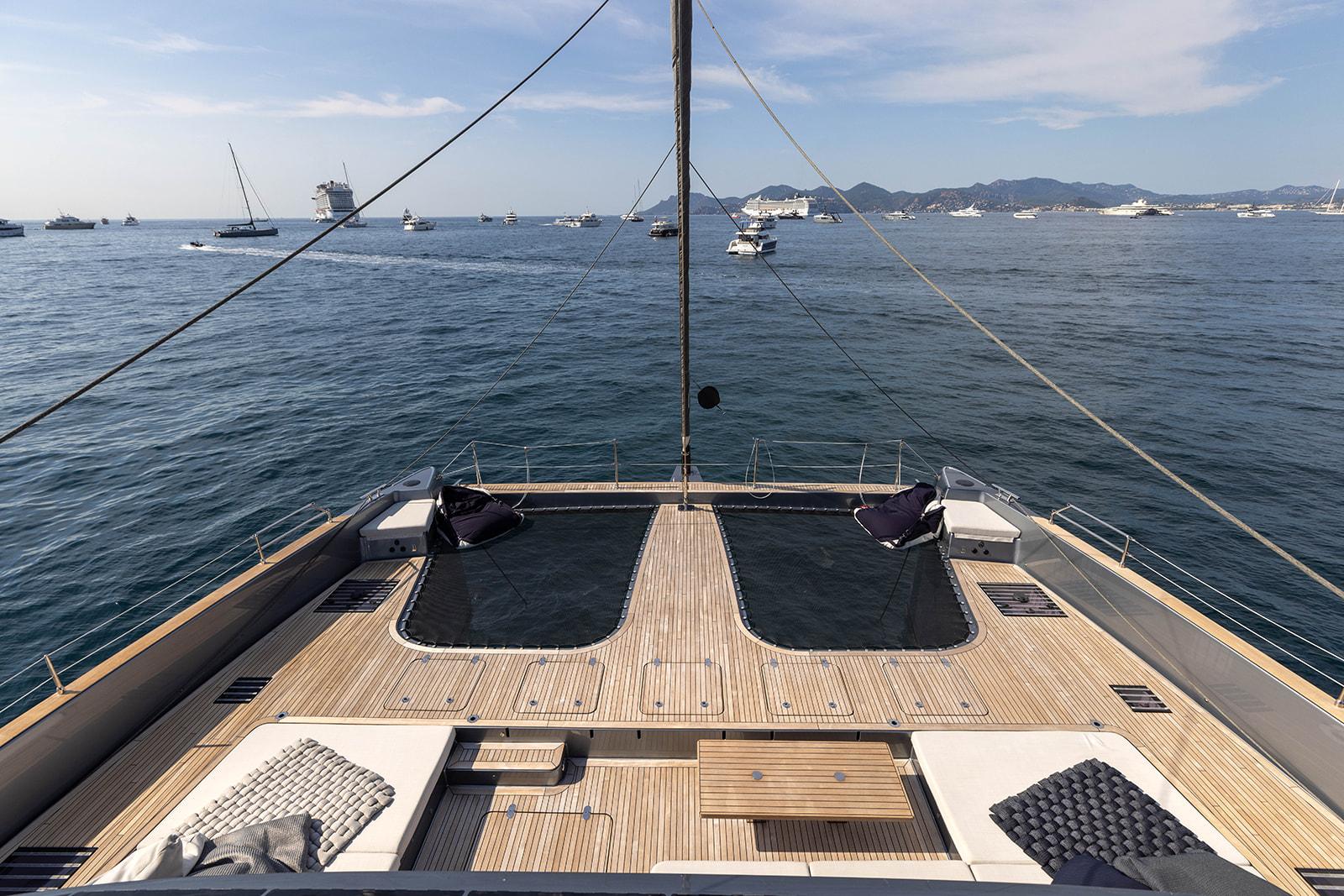 Luxurious Sunreef 80 Eco yacht deck with ocean view, 2023 model.