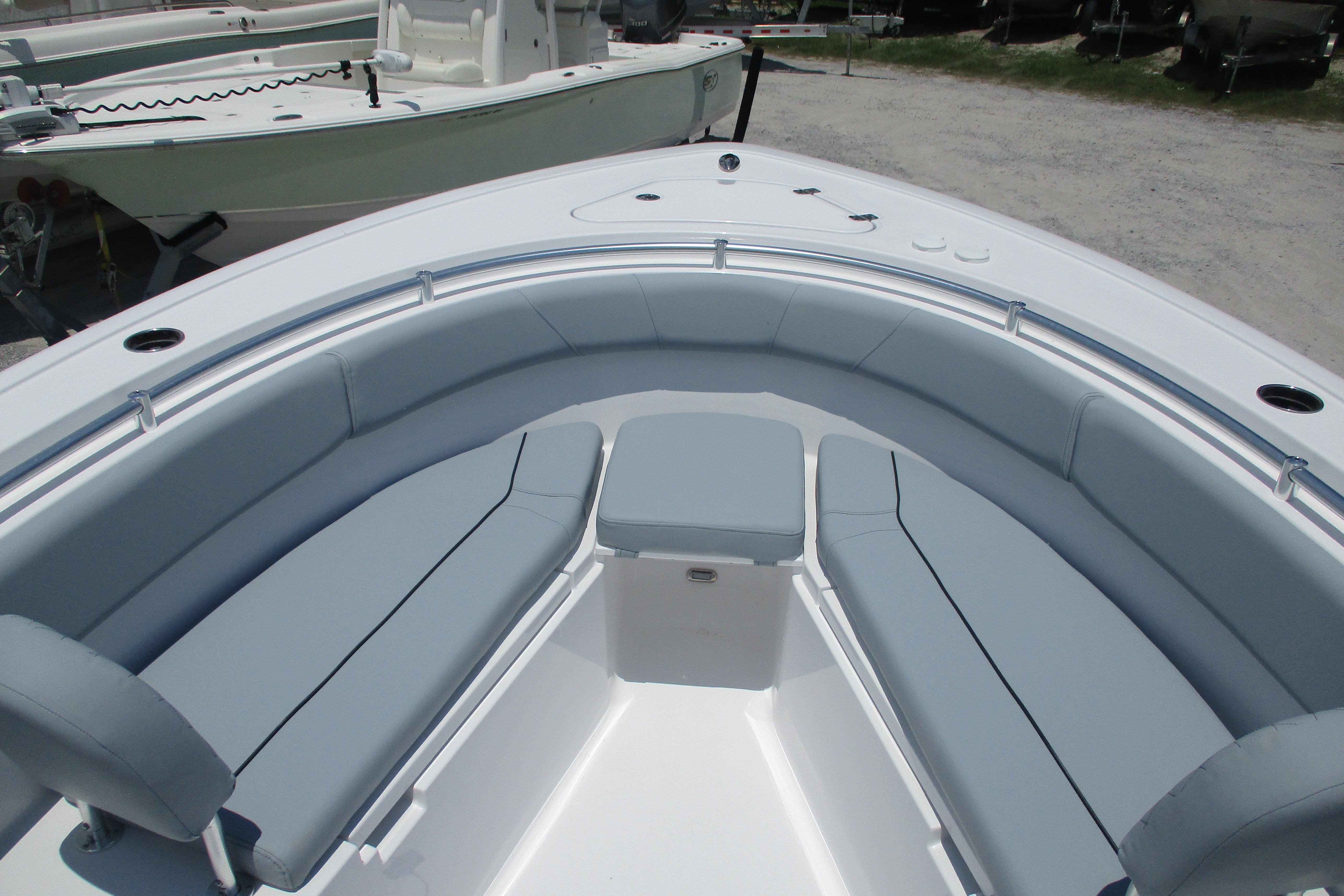 2027 Sportsman Open 252 Center Console boat with spacious seating area.
