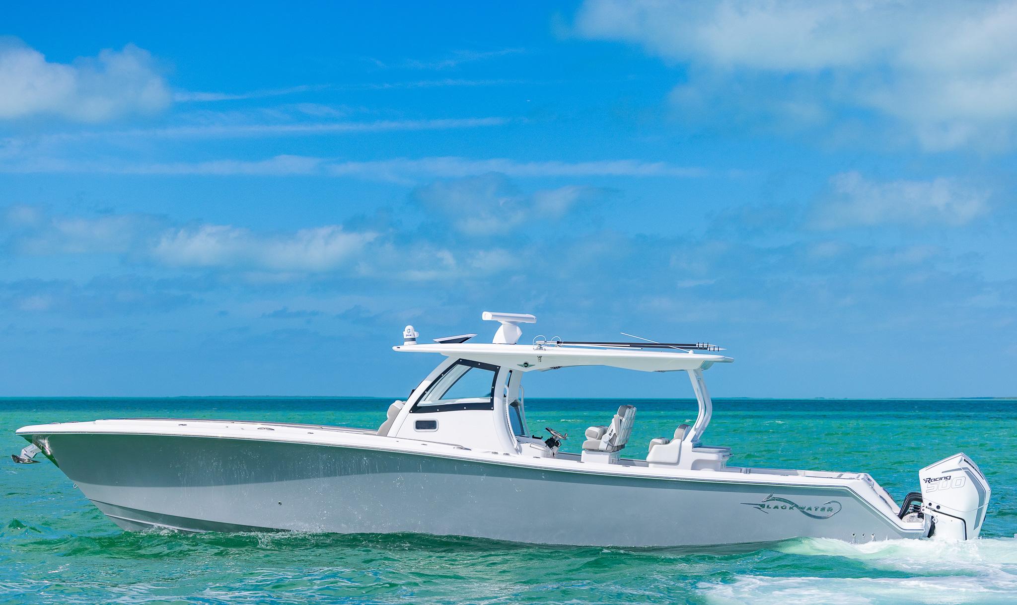 2025 Blackwater 43 Sportfish boat cruising on clear blue ocean waters.