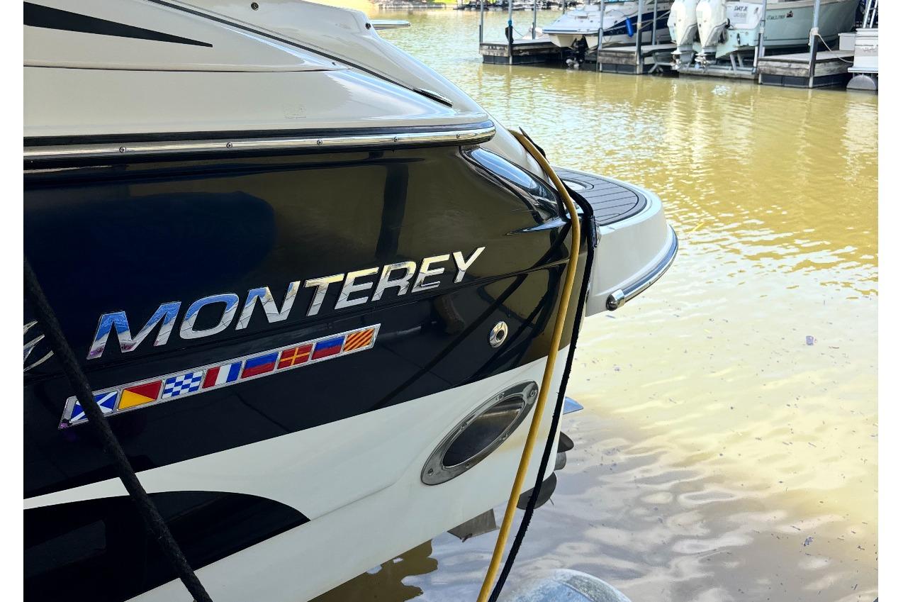2007 Monterey 298SSX Super Sport boat docked by the water.