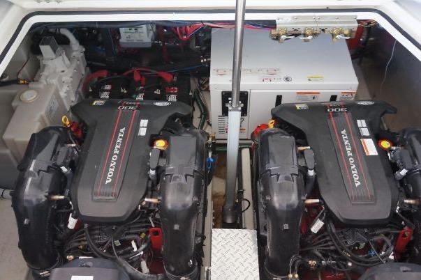 Engine room of 2012 Regal 35 Express Cruiser with dual Volvo Penta engines.