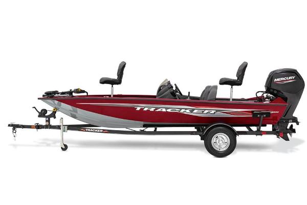 A red Tracker boat with two seats and a Mercury engine on a trailer.