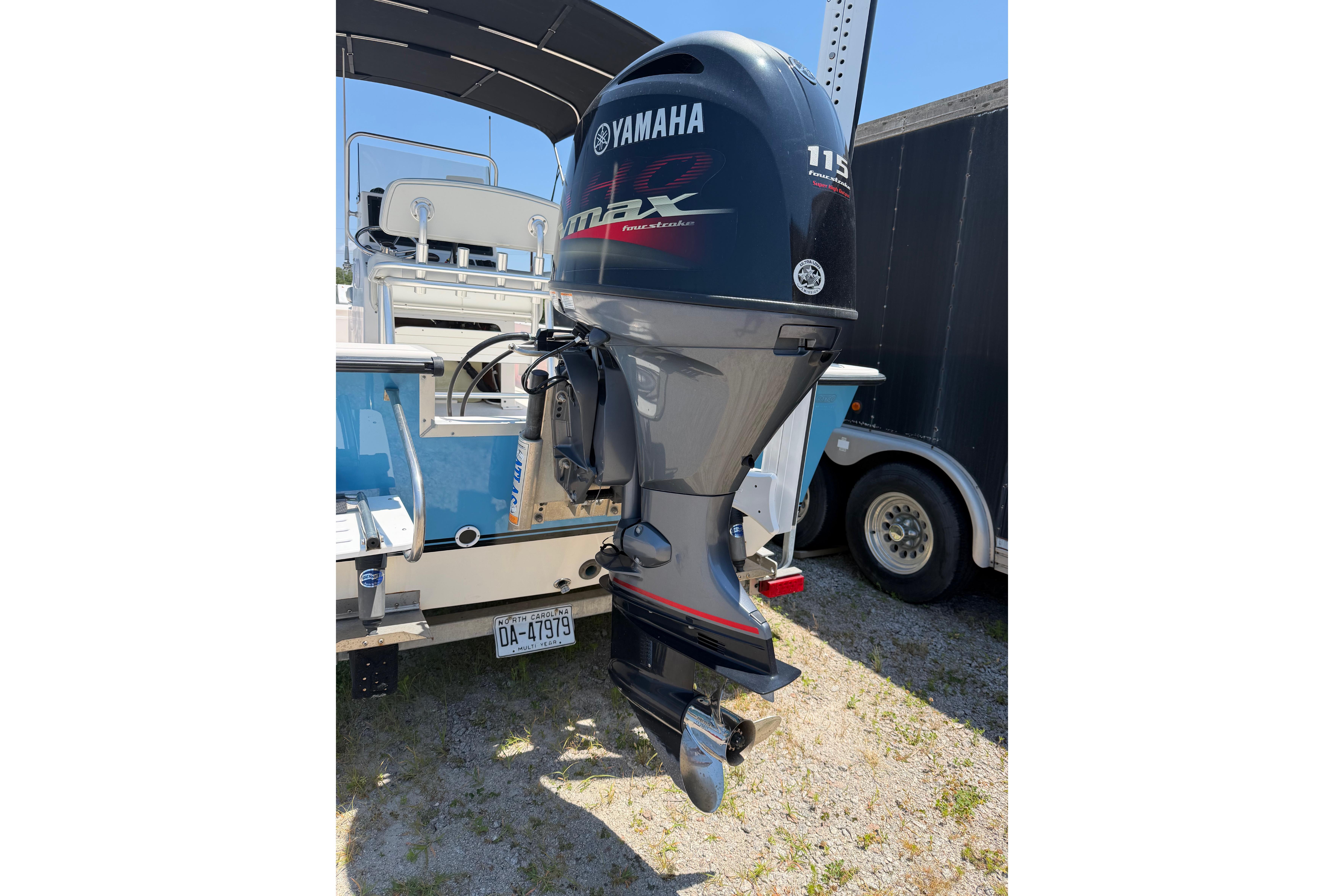 2008 KenCraft Bay Rider 2060 with Yamaha 115 outboard motor, parked on trailer.