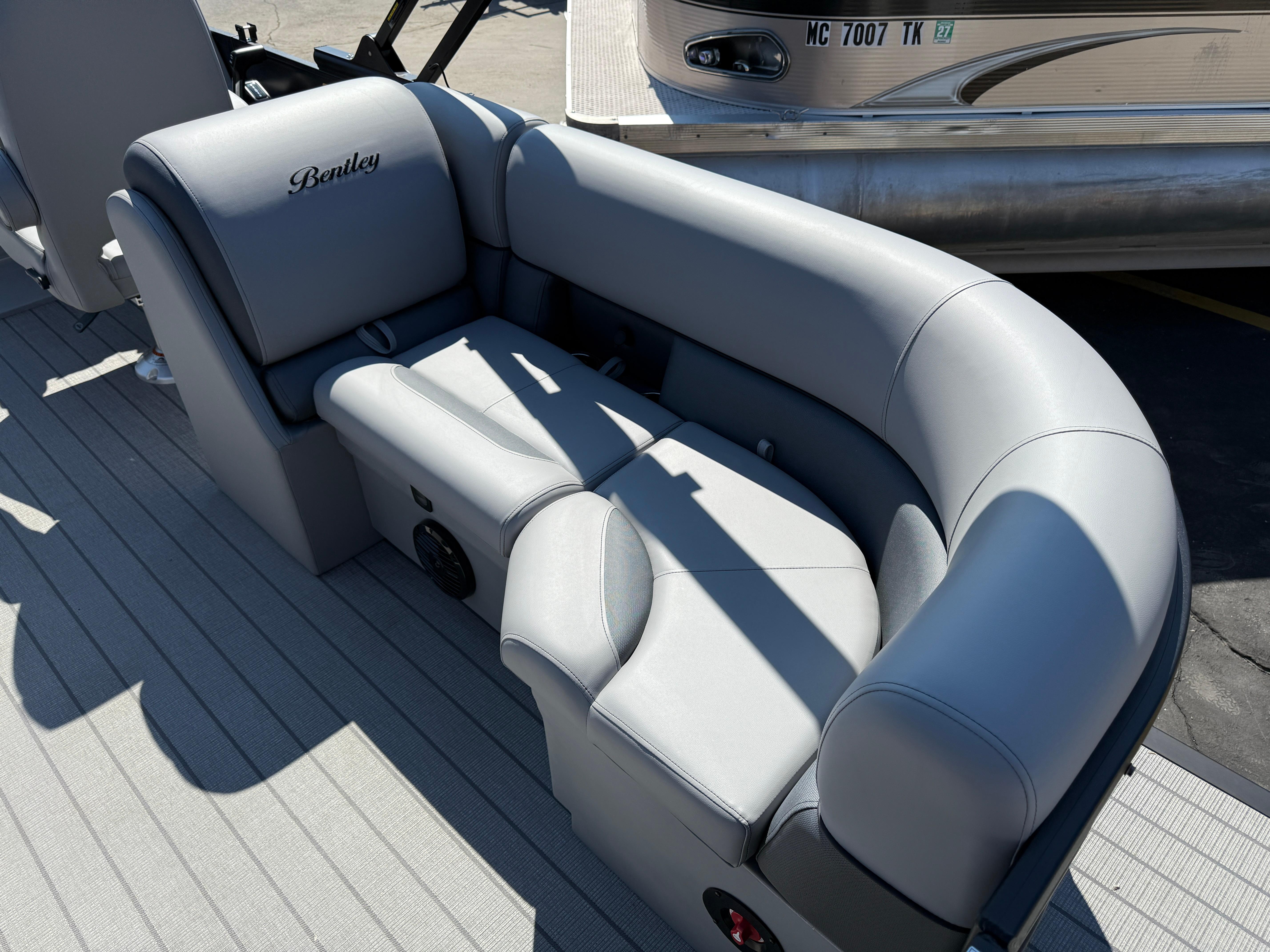 2026 Bentley Pontoons Legacy 223 Navigator, luxurious gray seating on a pontoon boat.
