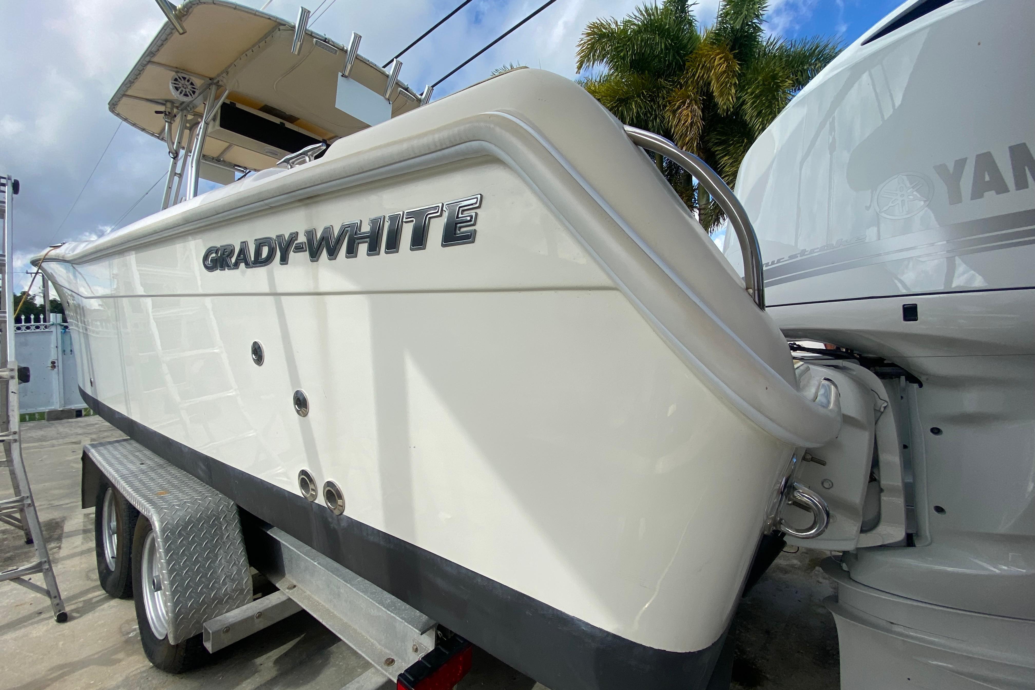 2004 Grady-White Canyon 283 boat on trailer, side view with Yamaha engine.