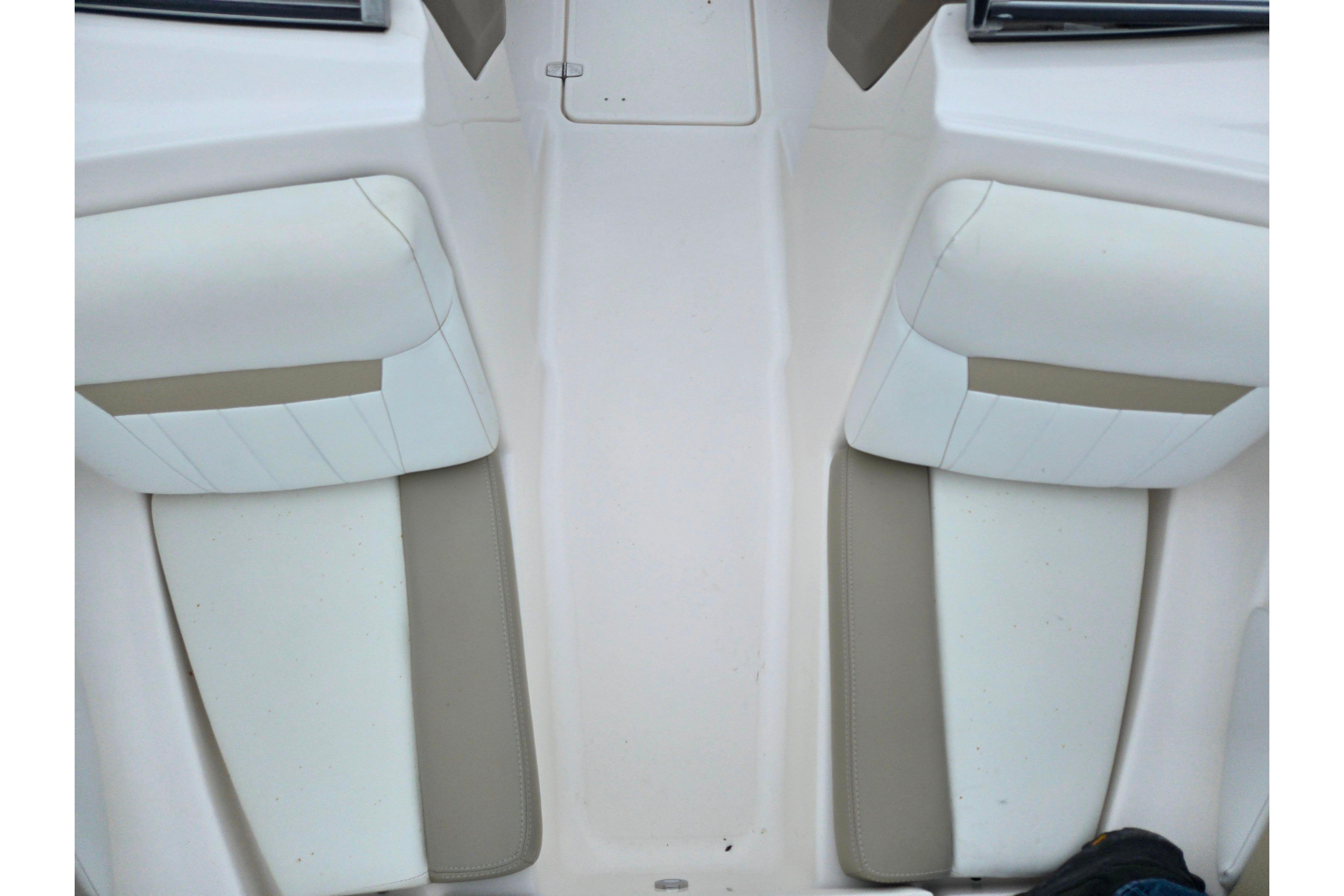 2015 Regal 1900 ES Bowrider interior seating, white and beige upholstery.