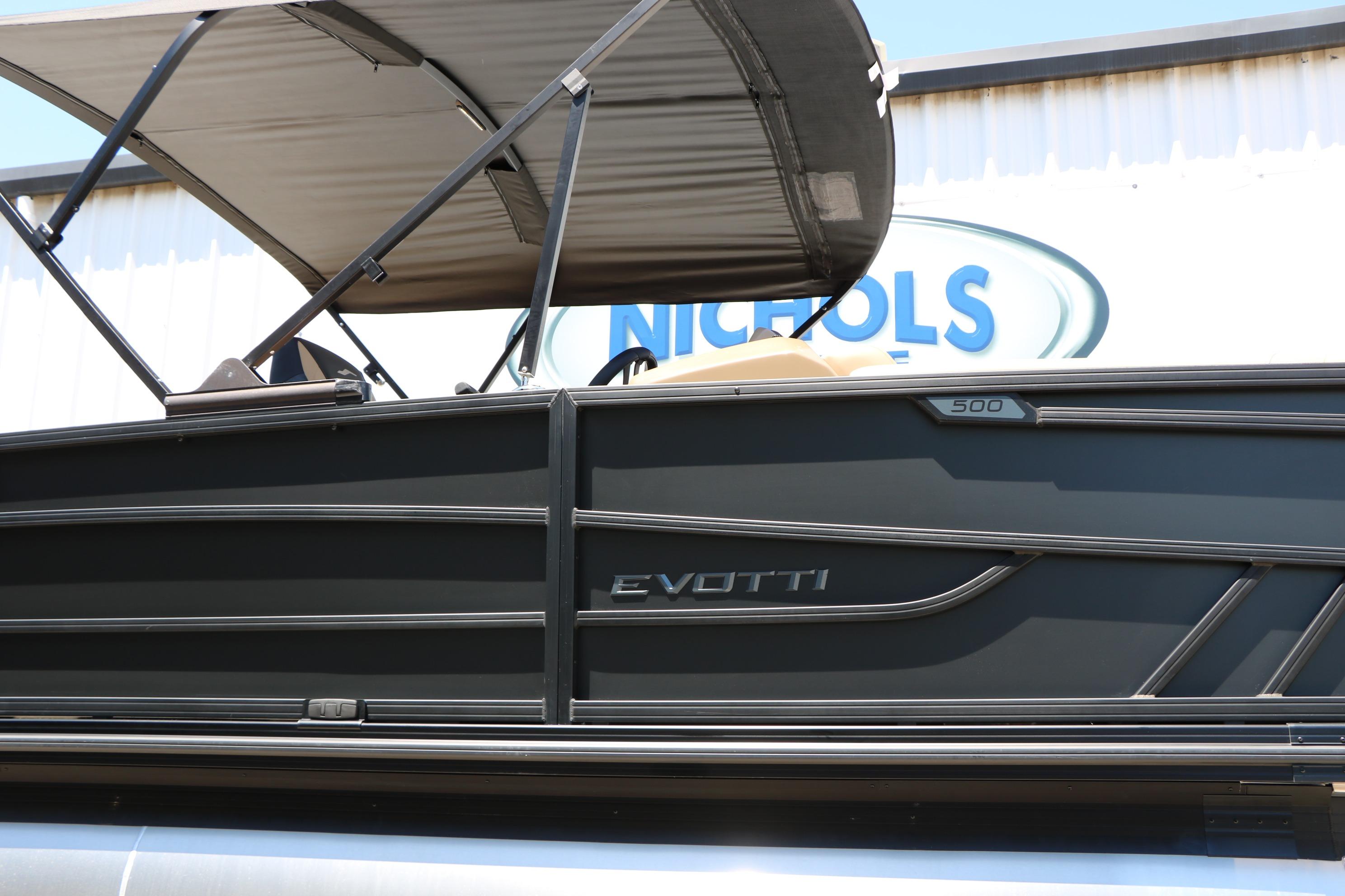 2026 Evotti 521CS boat with canopy, displayed at Nichols dealership.