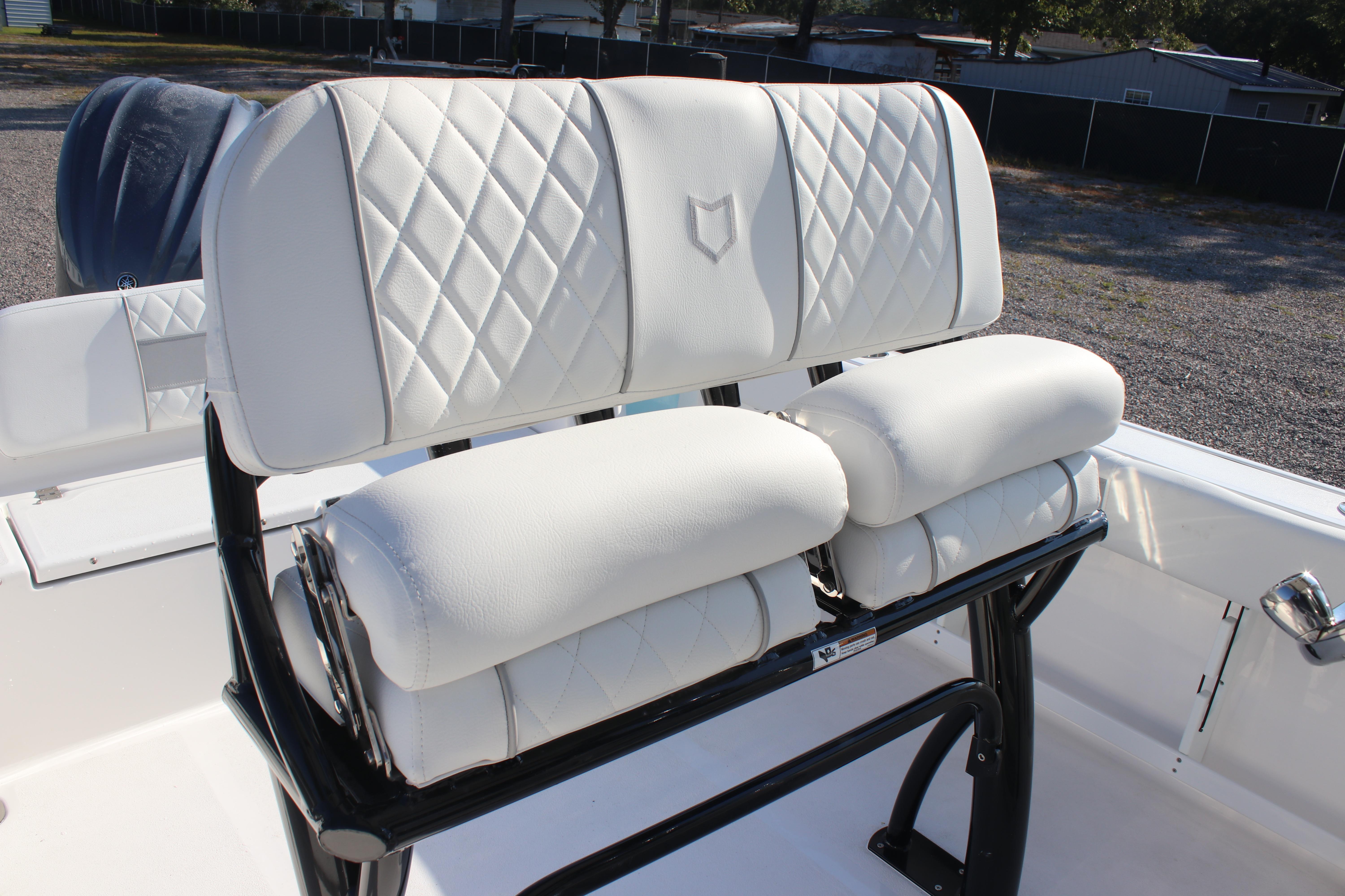 2026 Sea Fox 248 Commander boat seating with white diamond-stitched upholstery.