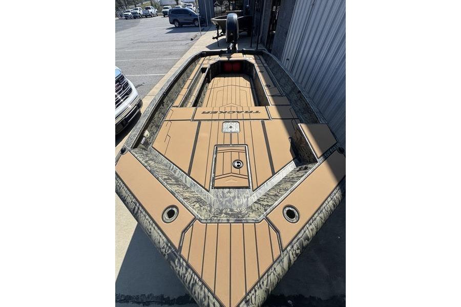 2026 Tracker Grizzly 1756 T Marsh boat with camouflage and tan deck design.
