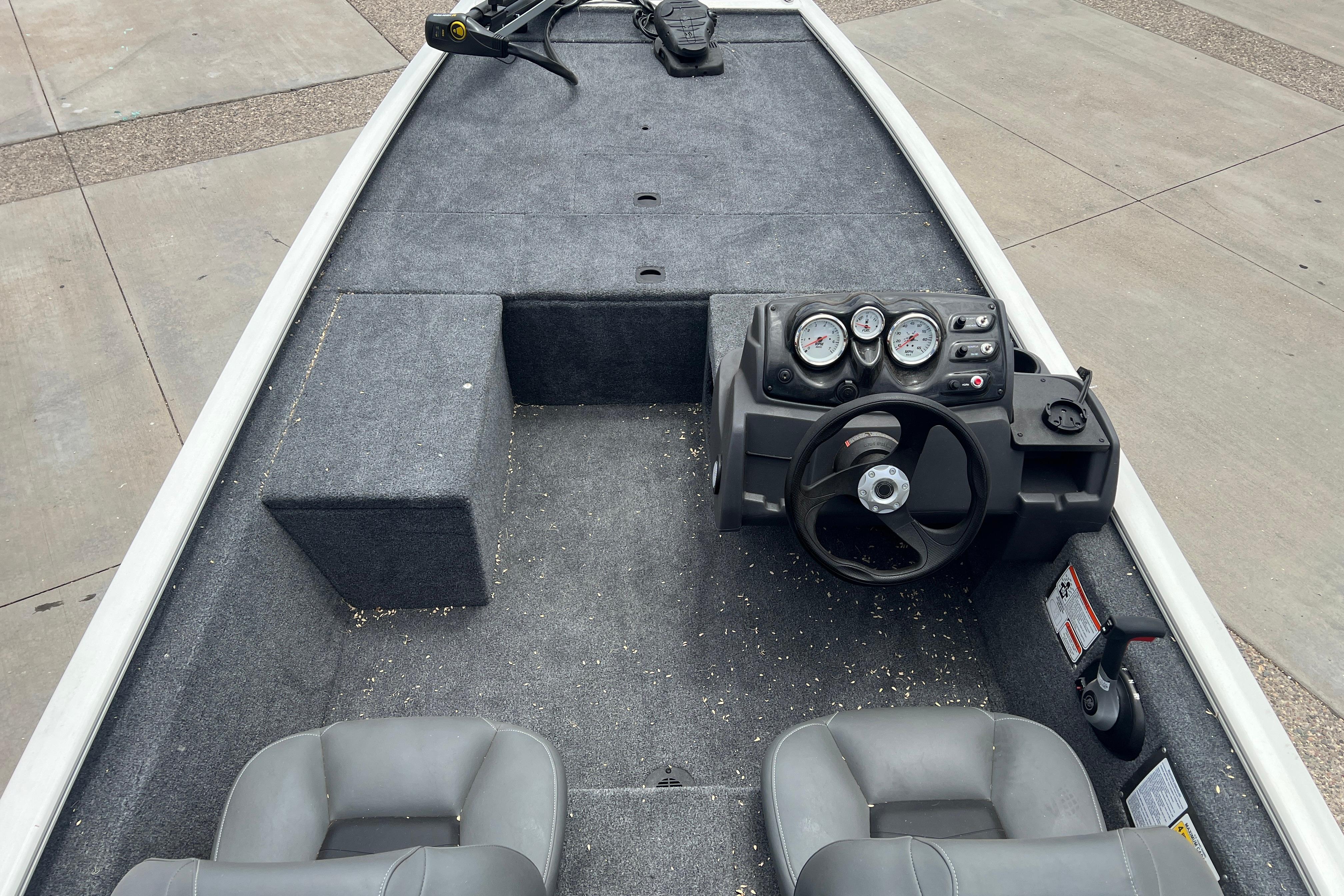 2026 Tracker Pro 170 boat interior with steering console and seating.