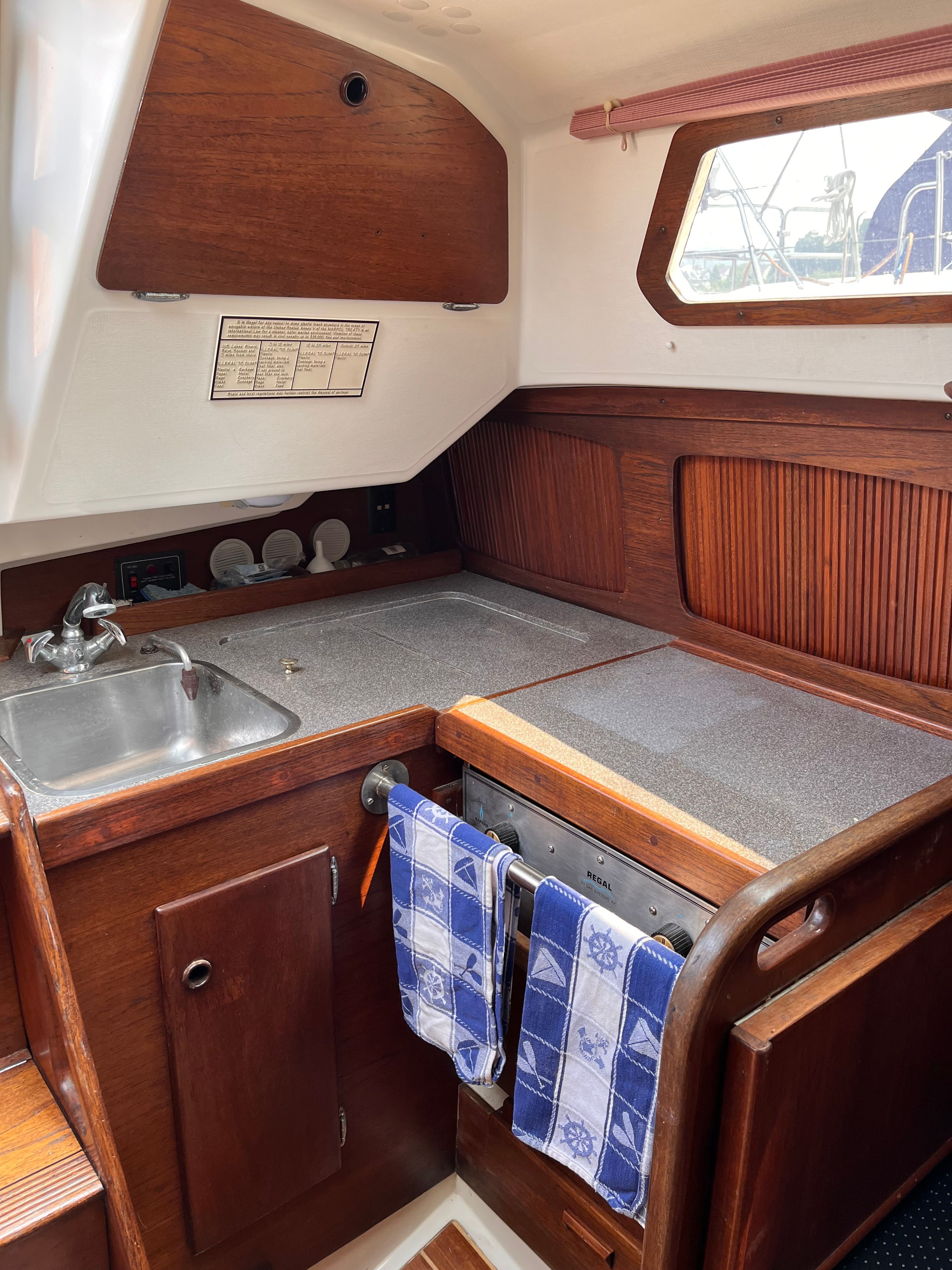 Interior of a 1989 Sabre 30 III yacht with kitchen area.