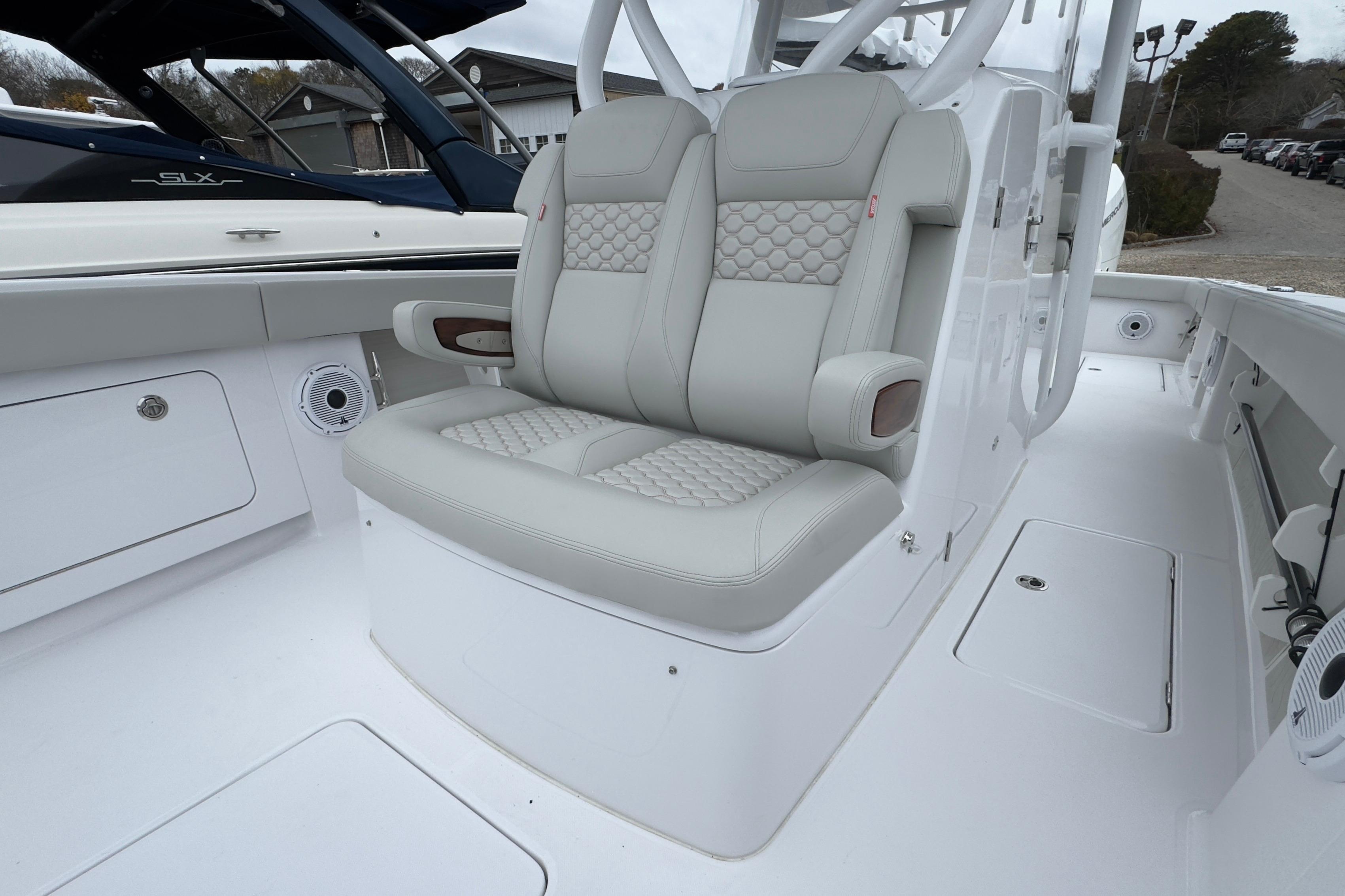 2024 Jupiter 32 FS boat with luxurious dual seating and modern design.